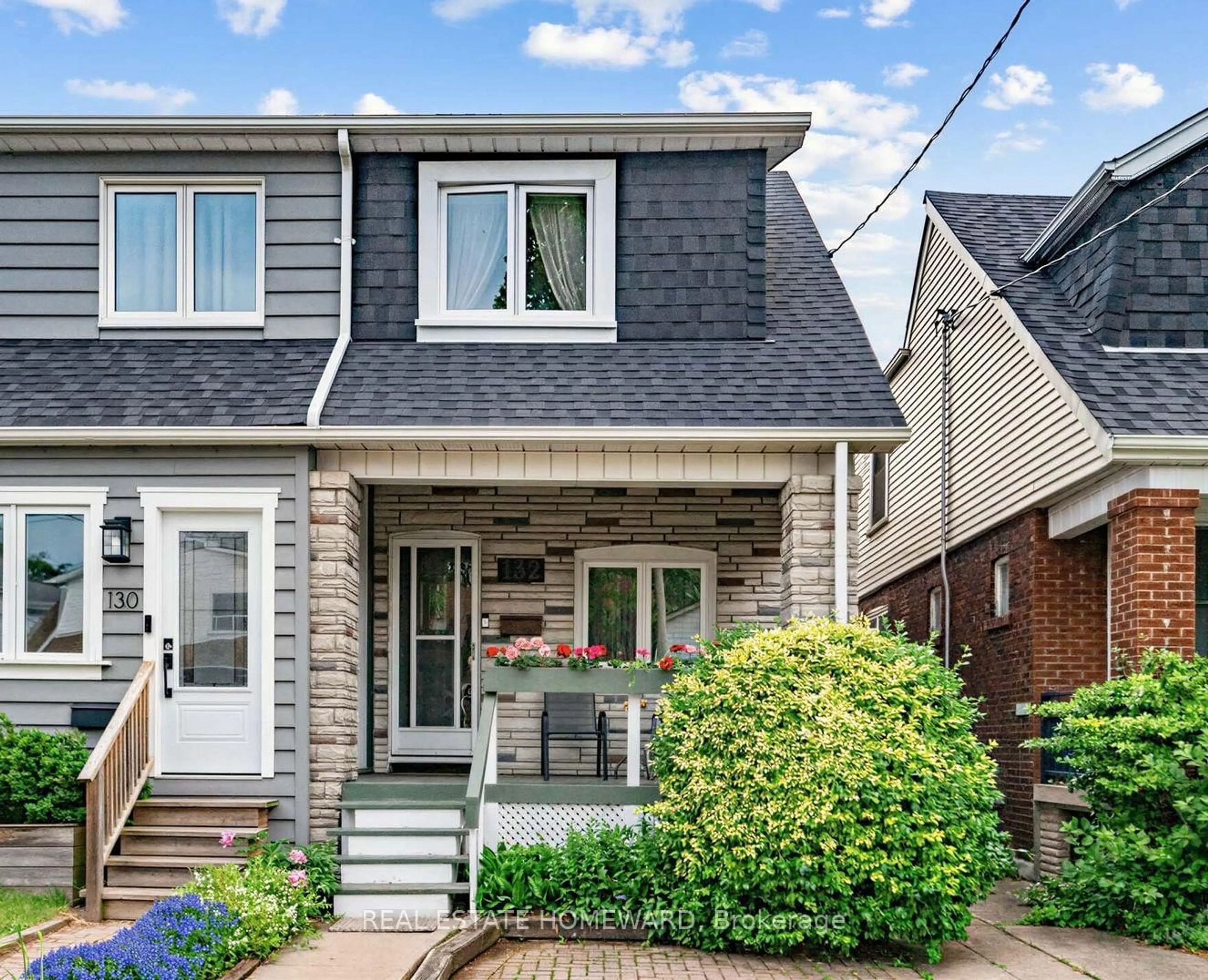 Home with vinyl exterior material, street for 132 Woodmount Ave, Toronto Ontario M4C 3Y8