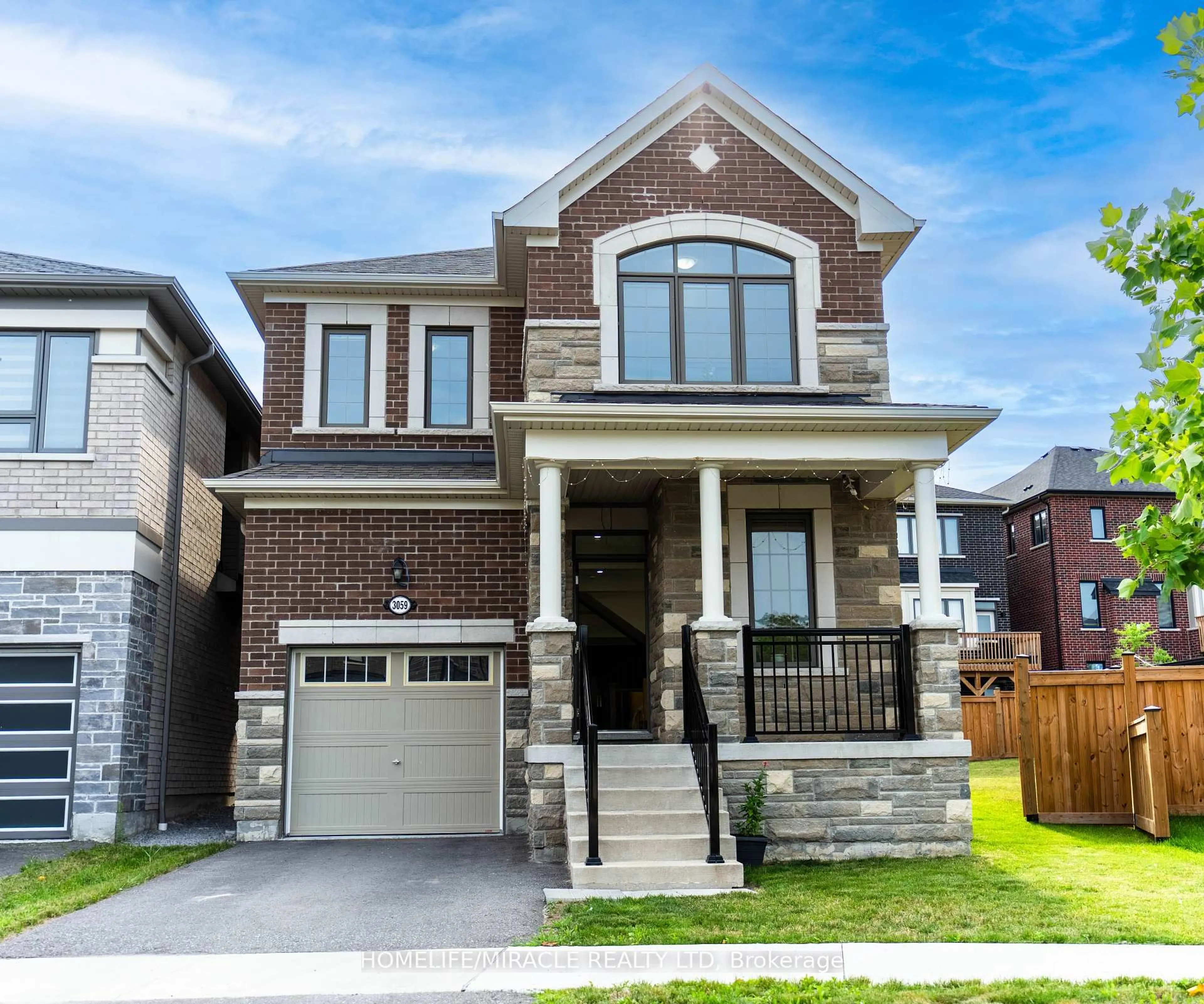 Home with brick exterior material, street for 3059 Hollyberry Tr, Pickering Ontario L1X 0N5