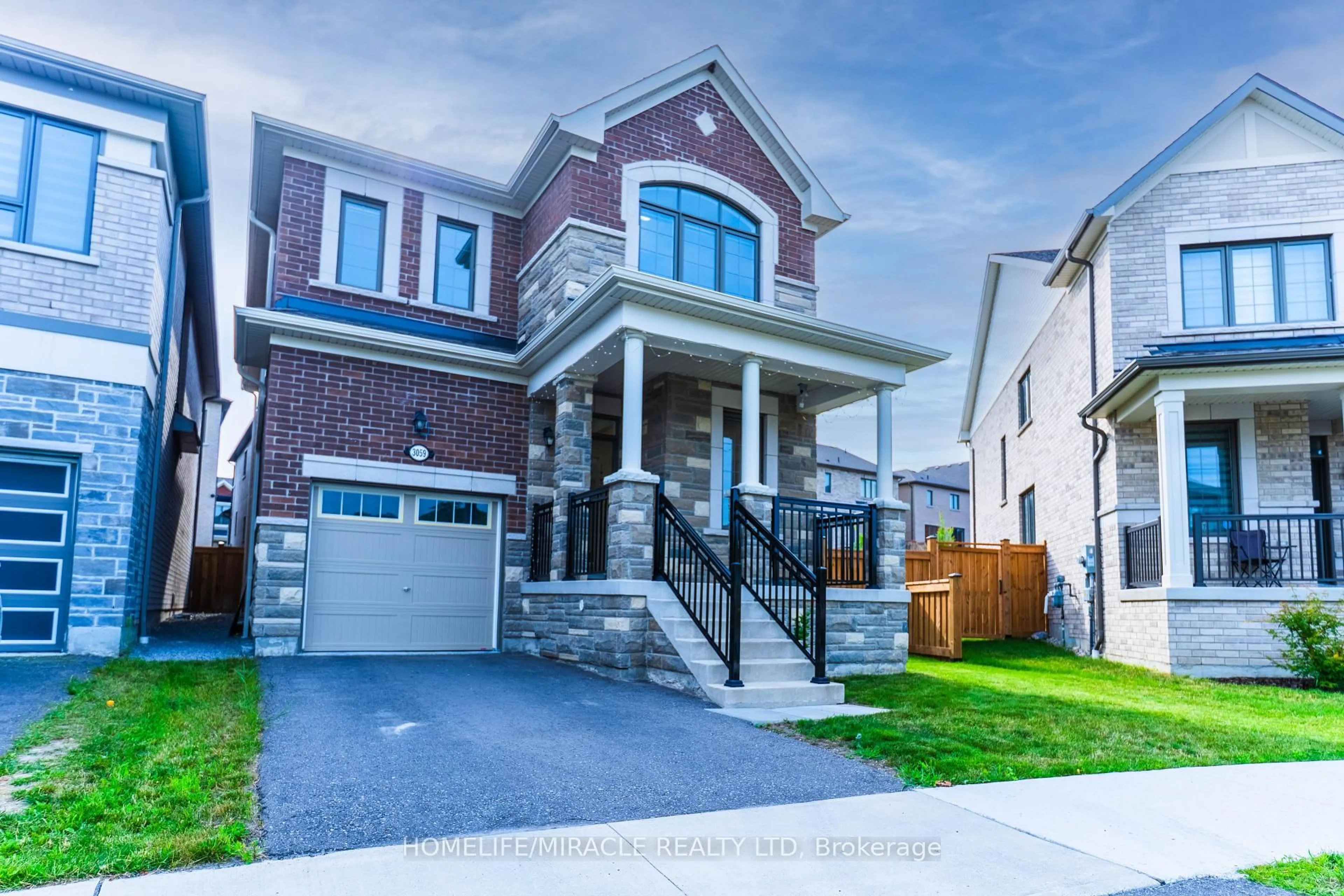 Home with brick exterior material, street for 3059 Hollyberry Tr, Pickering Ontario L1X 0N5