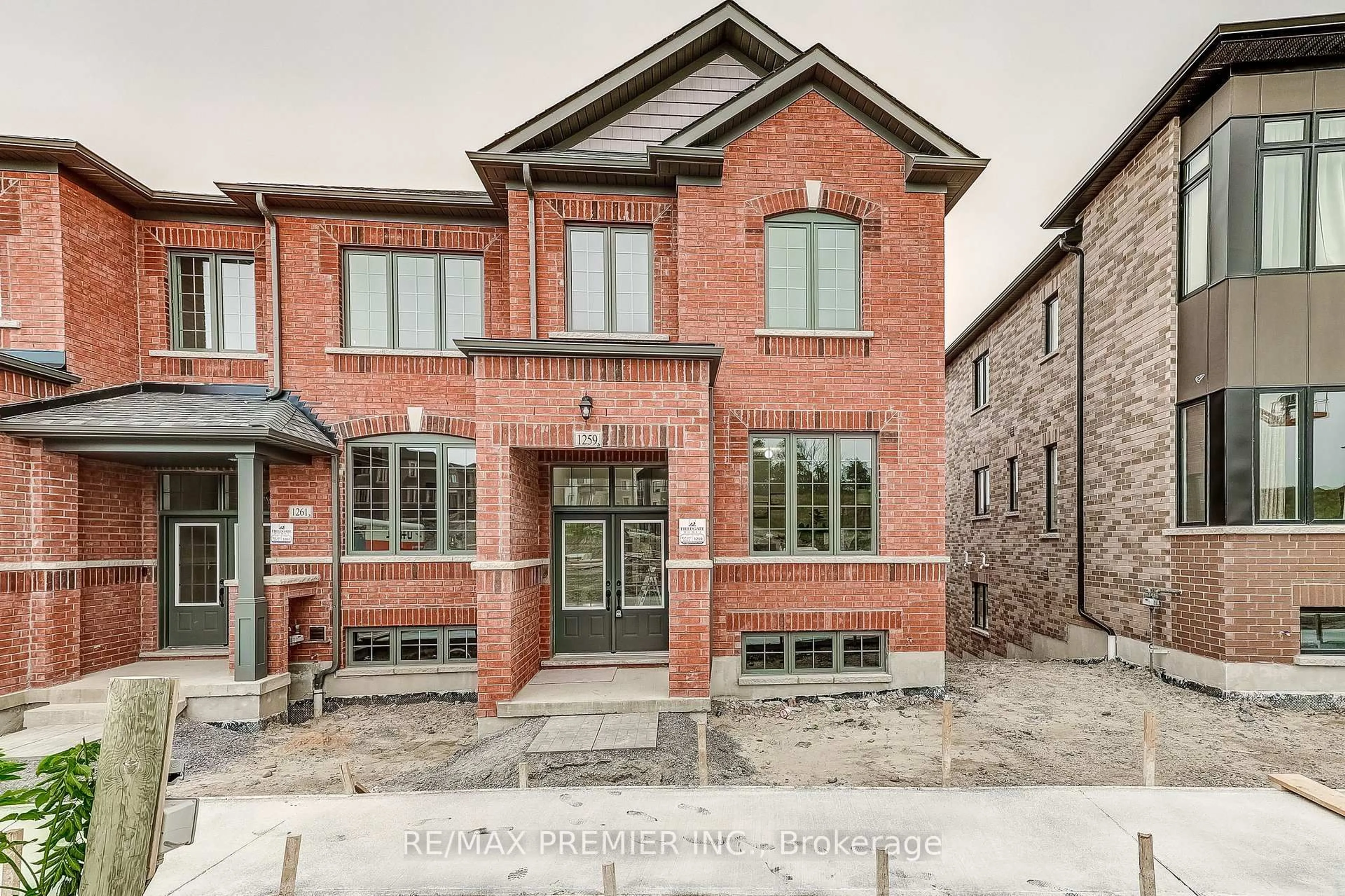 Home with brick exterior material, street for 1259 Winding Woods Tr, Pickering Ontario L1X 0S3