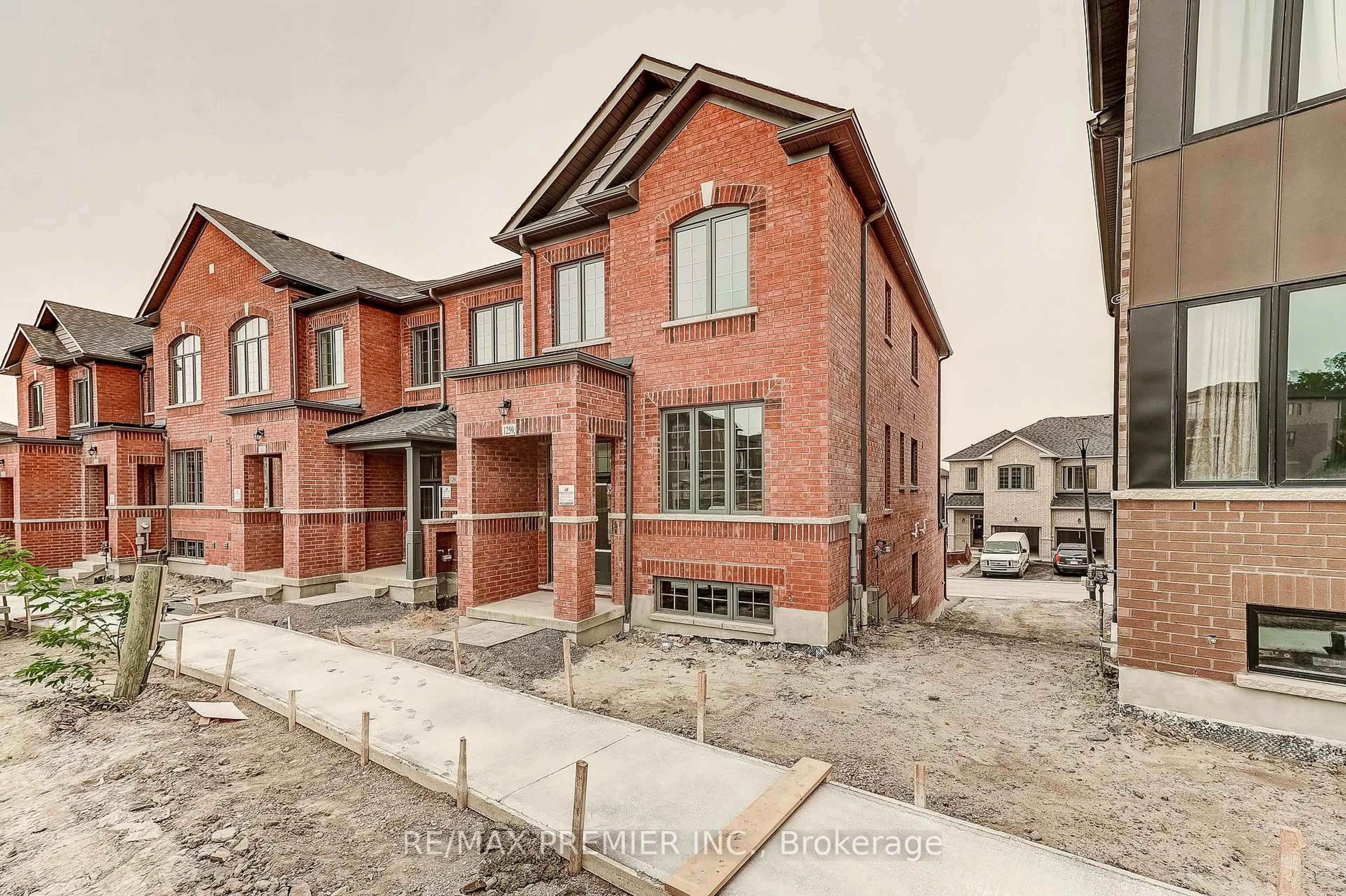 Home with brick exterior material, street for 1259 Winding Woods Tr, Pickering Ontario L1X 0S3