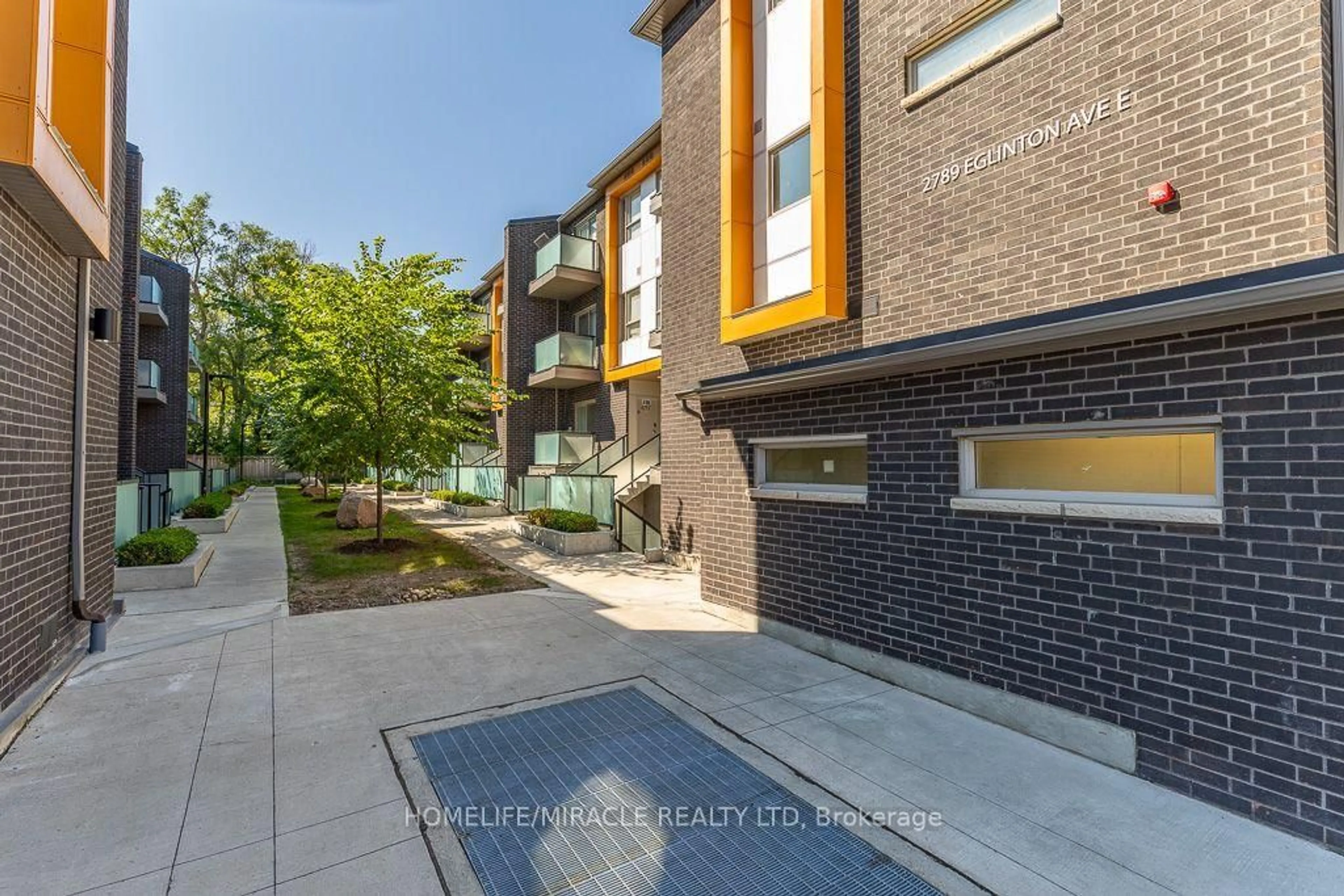 A pic from outside/outdoor area/front of a property/back of a property/a pic from drone, street for 2789 Eglinton Ave #413, Toronto Ontario M1J 0B3