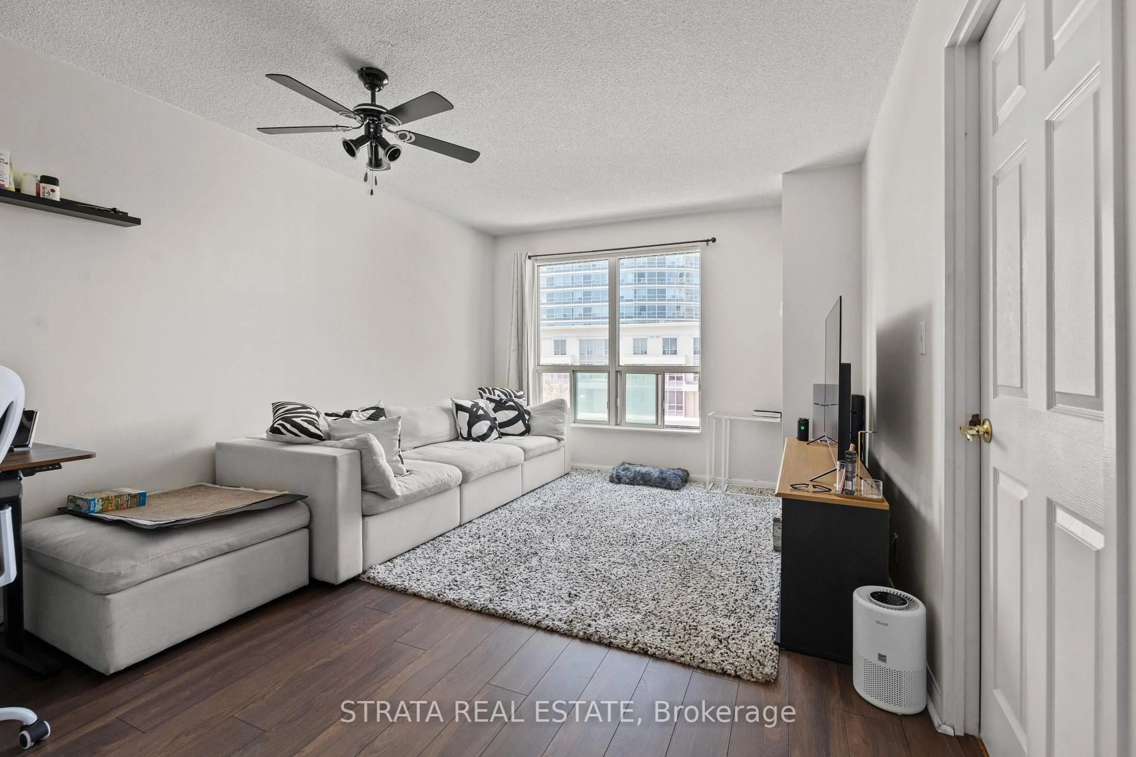 Living room with furniture, unknown for 1 Lee Centre Dr #313, Toronto Ontario M1H 3J2