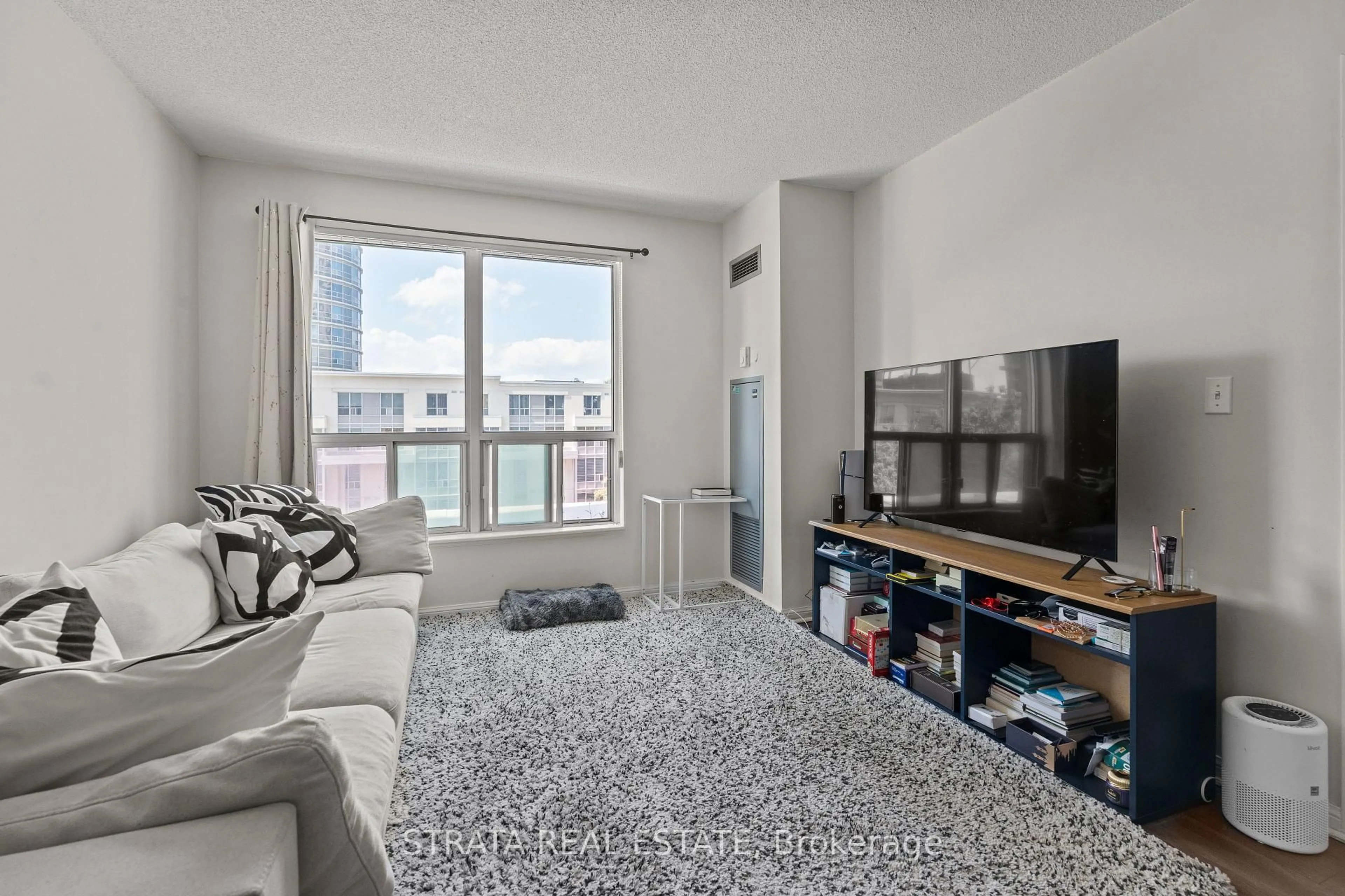 Living room with furniture, unknown for 1 Lee Centre Dr #313, Toronto Ontario M1H 3J2