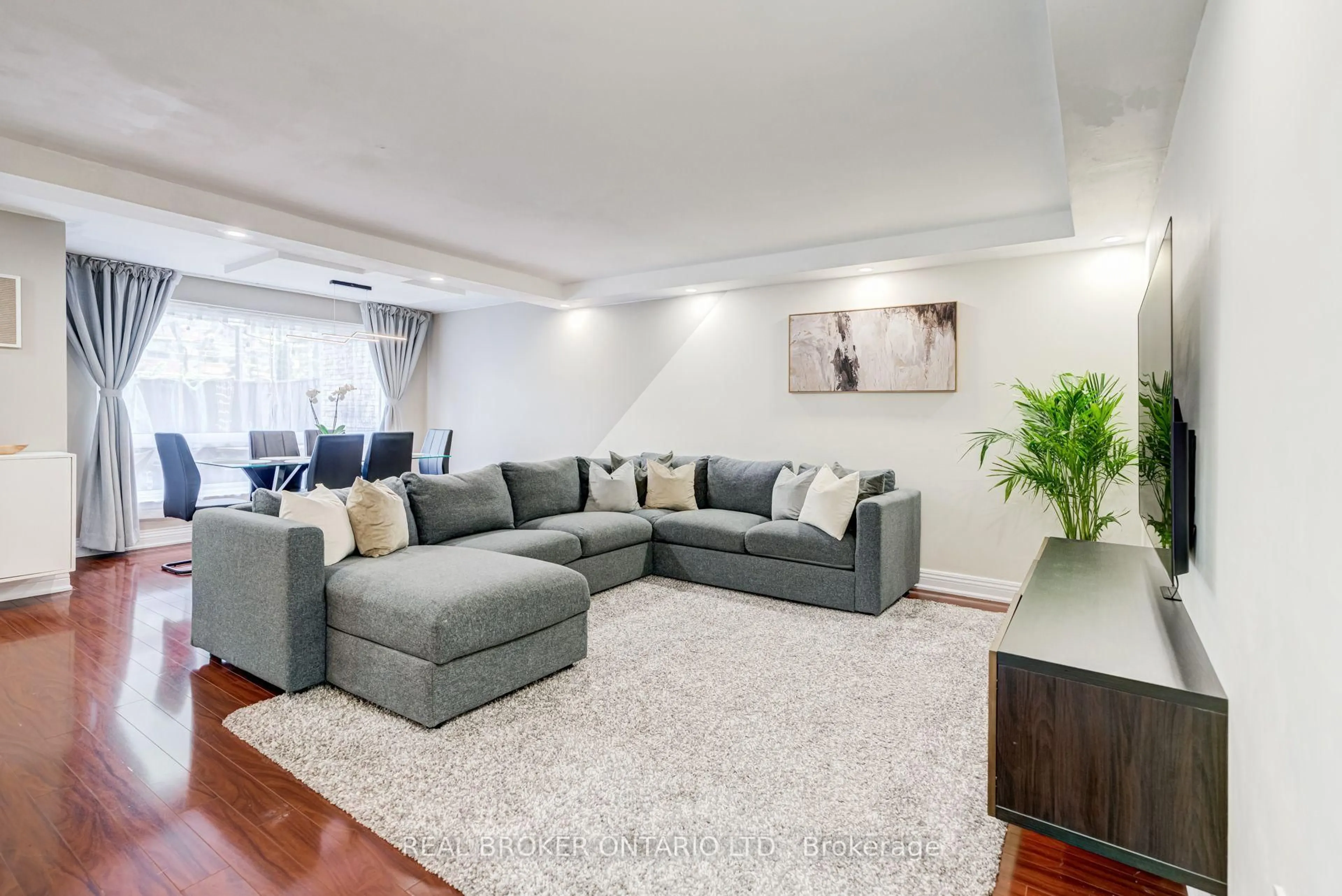 Living room with furniture, unknown for 130 Ling Rd #62, Toronto Ontario M1E 4V9