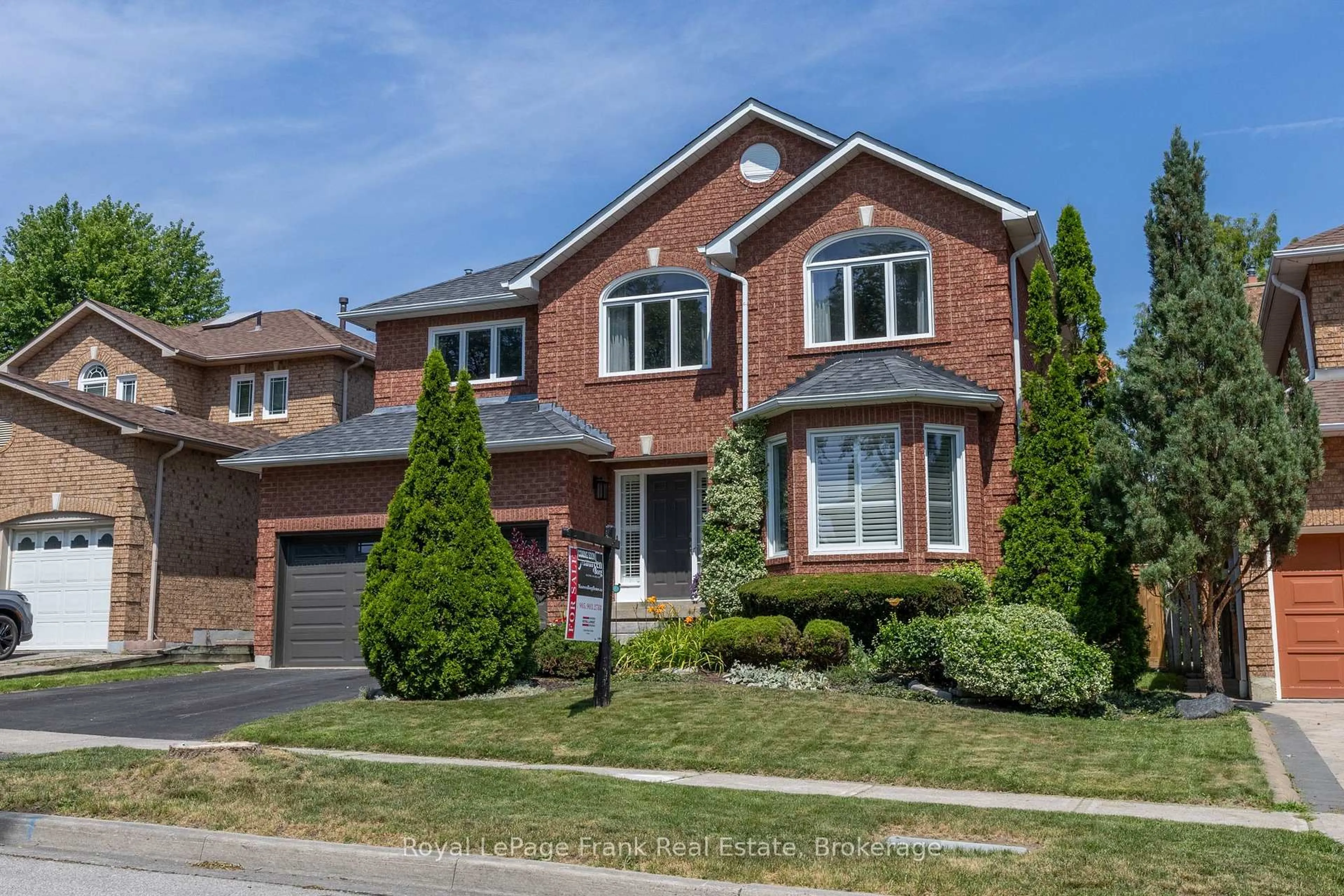 Home with brick exterior material, street for 10 Cork Dr, Whitby Ontario L1R 2C7