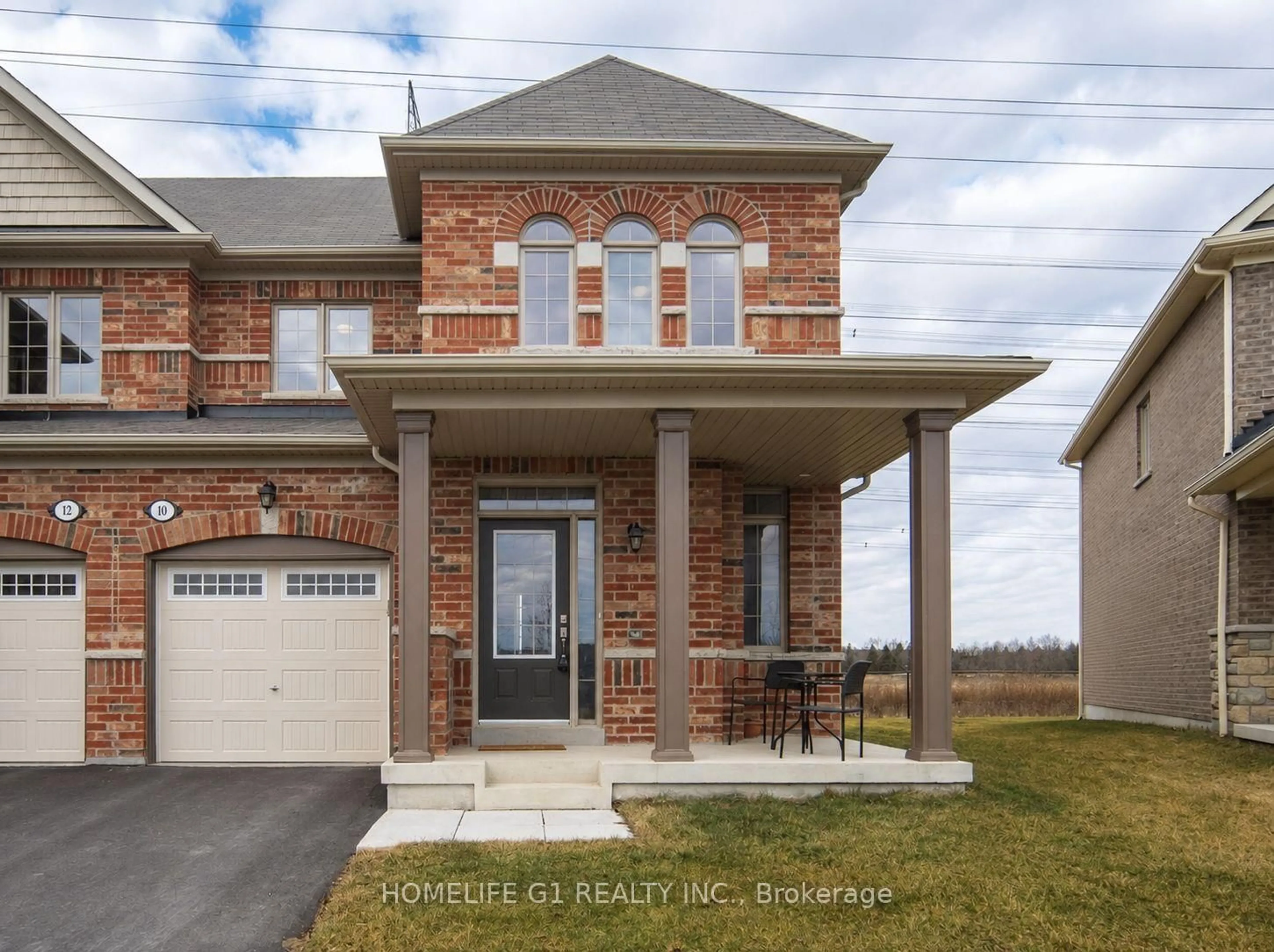 Home with brick exterior material, street for 10 Hurst Dr, Ajax Ontario L1T 0N8