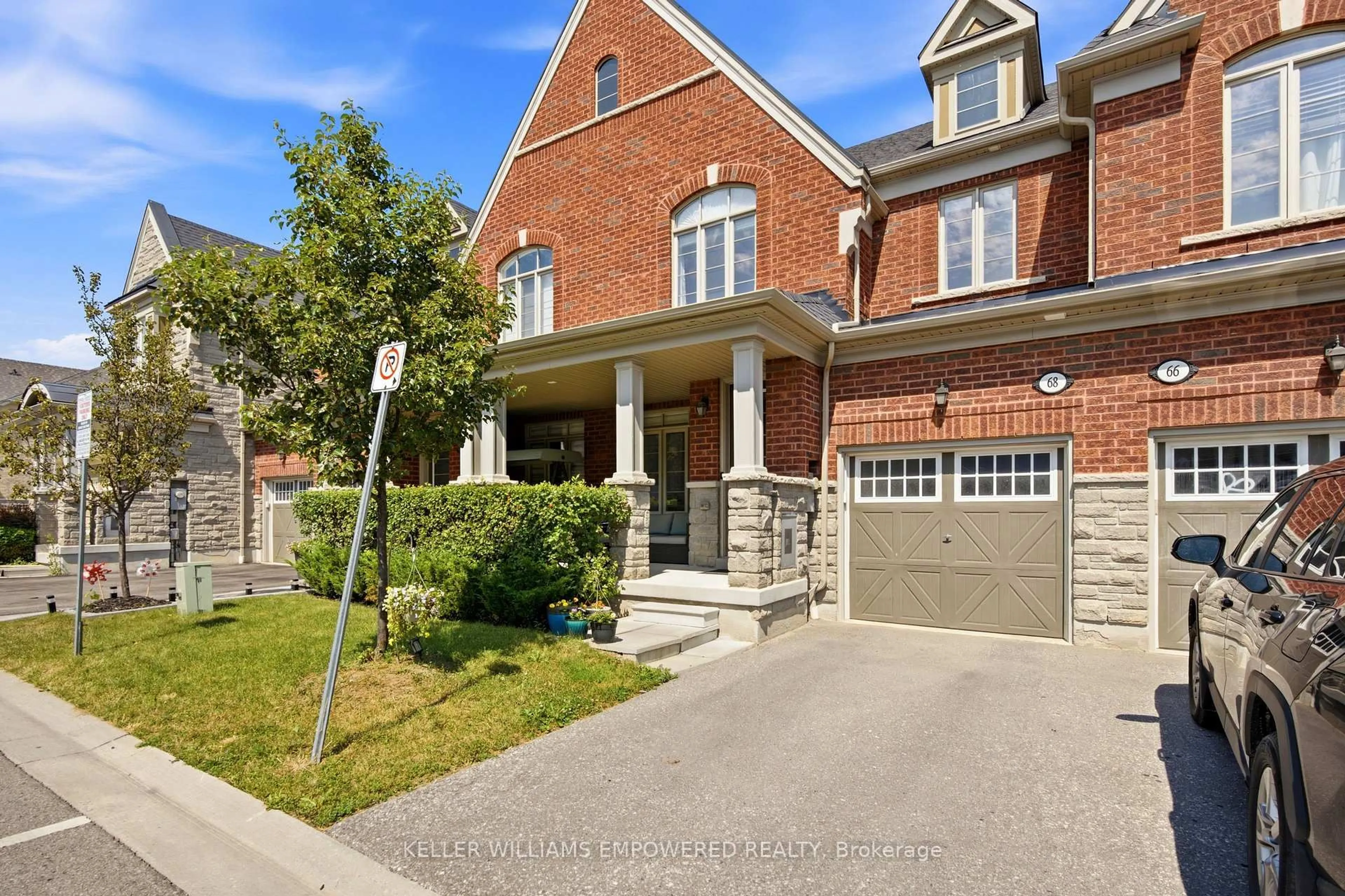 Home with brick exterior material, street for 68 Workmens Circ, Ajax Ontario L1T 0N7