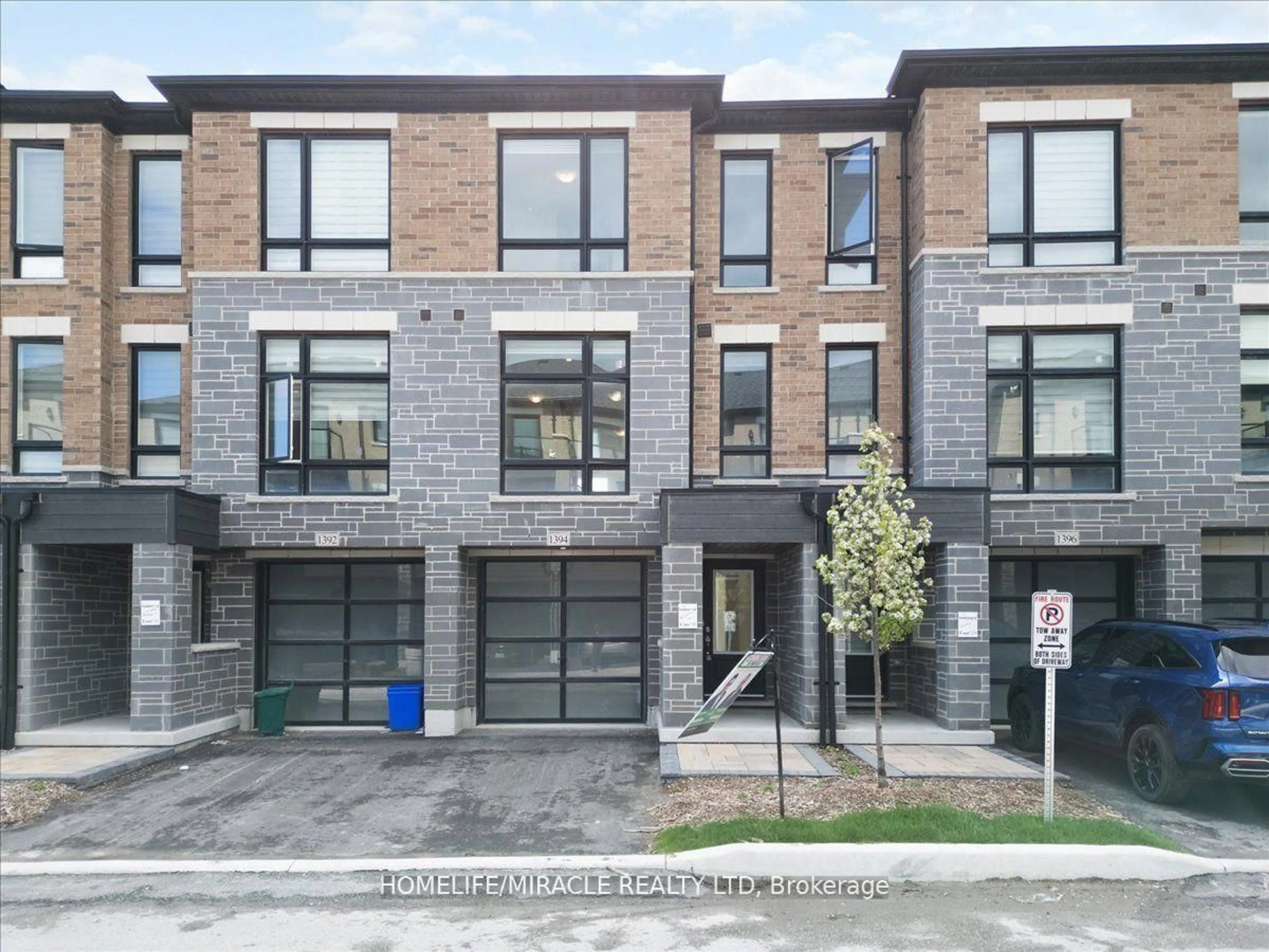 Home with brick exterior material, street for 1392 Coral Springs Path, Oshawa Ontario L1K 3G1