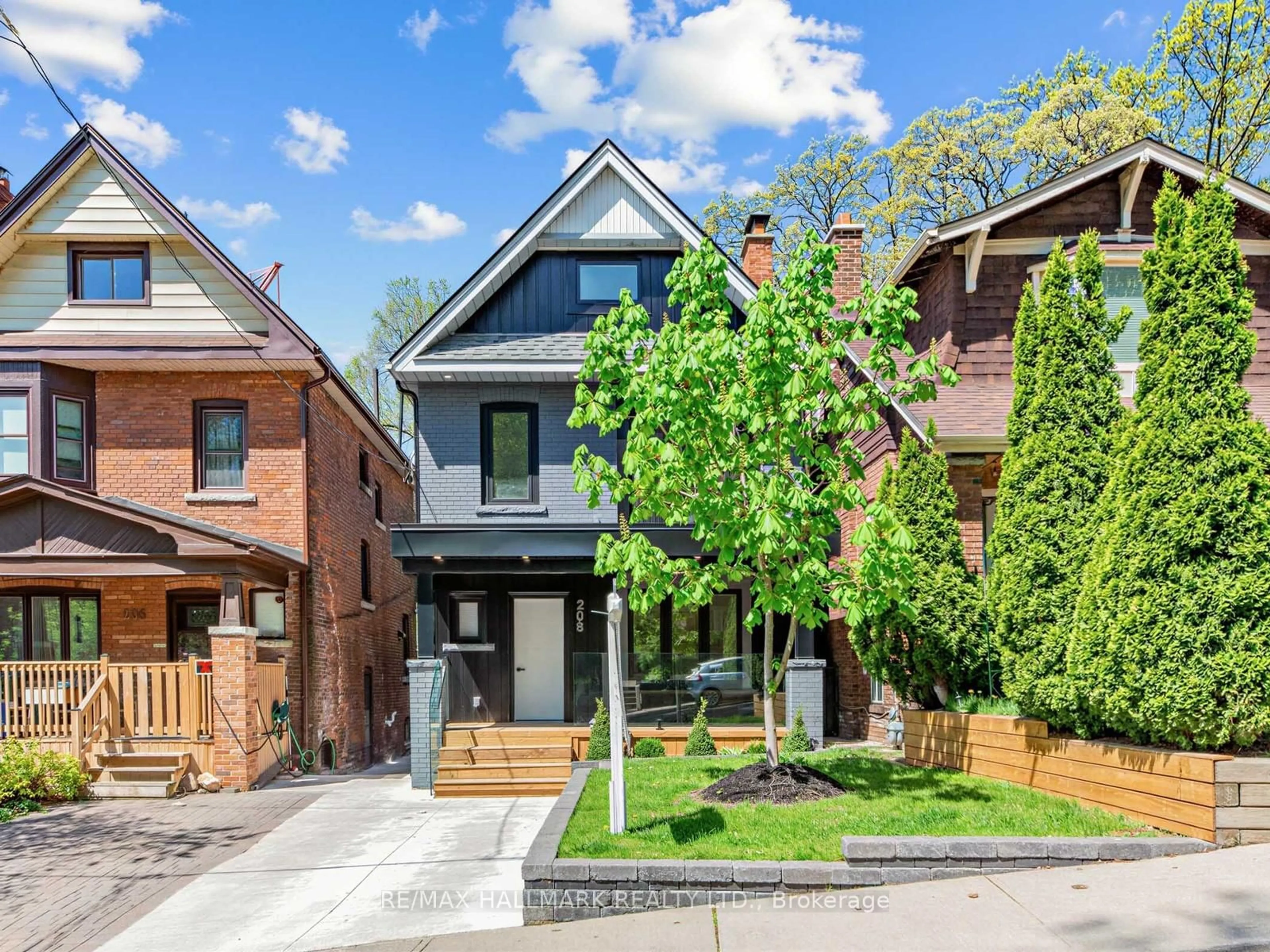 Home with brick exterior material, street for 208 Gainsborough Rd, Toronto Ontario M4L 3C6