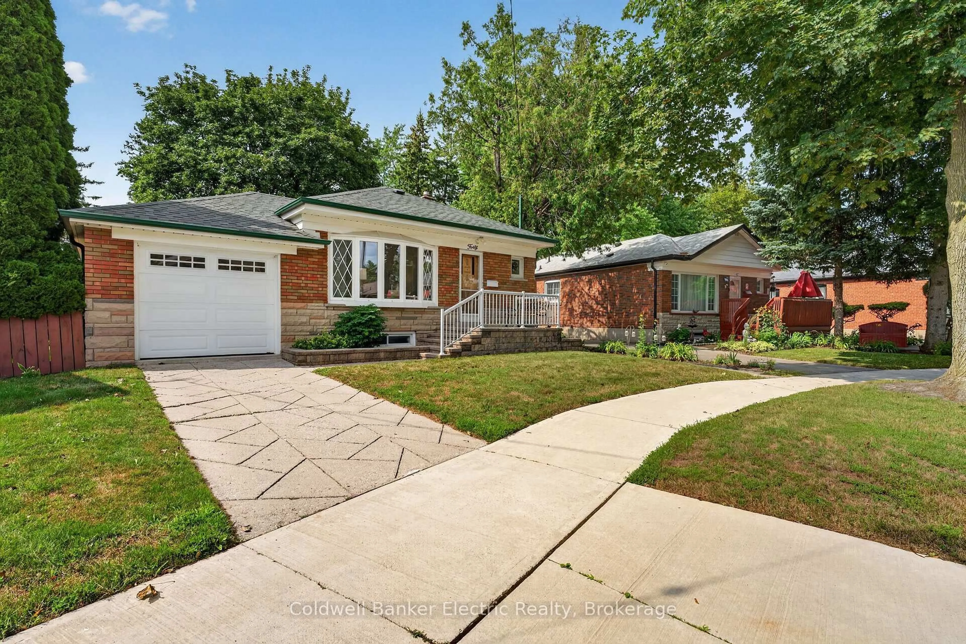 Home with brick exterior material, street for 40 Wortham Dr, Toronto Ontario M1G 1W4