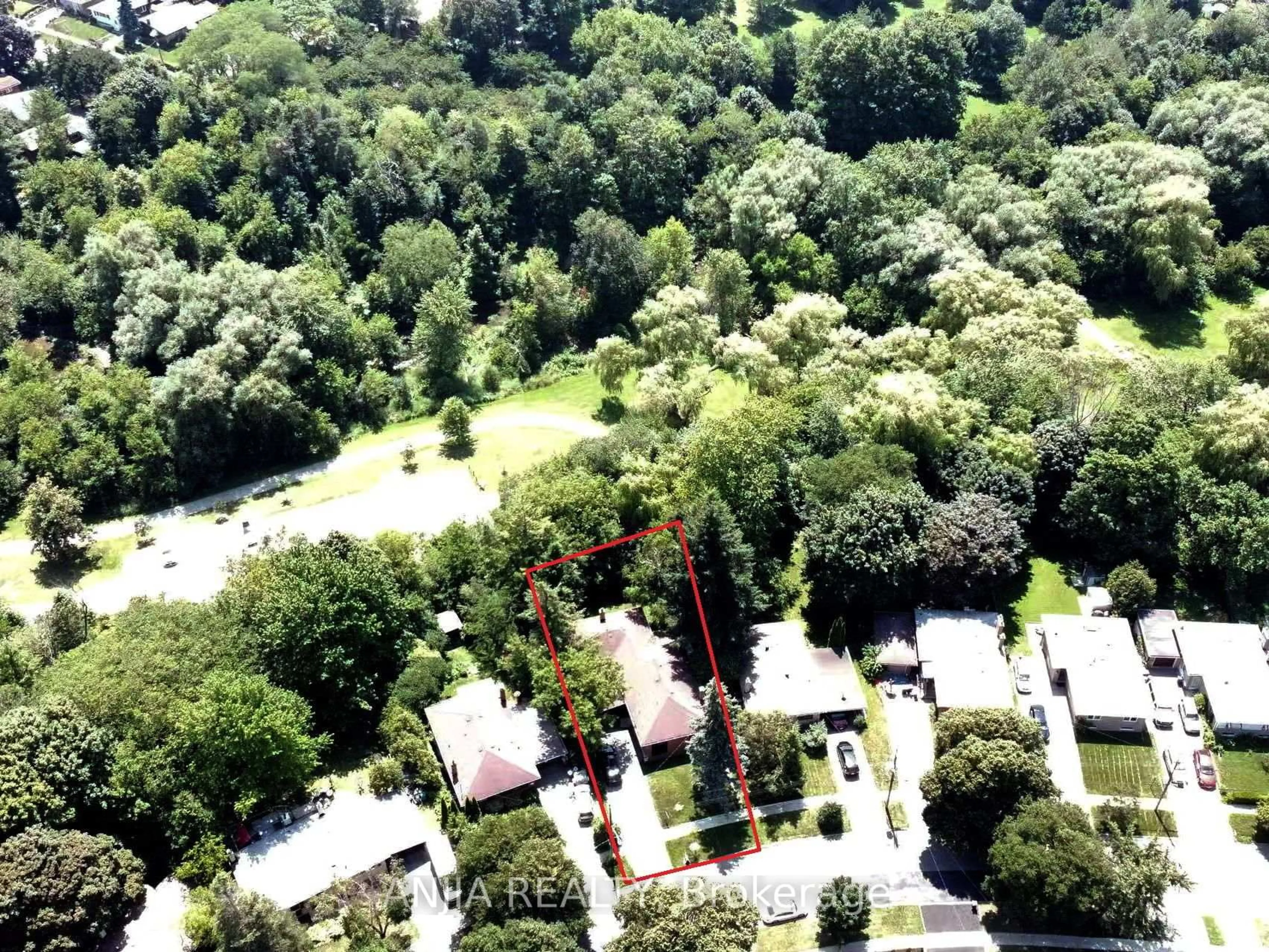 A pic from outside/outdoor area/front of a property/back of a property/a pic from drone, forest/trees view for 8 Applefield Dr, Toronto Ontario M1P 3X9