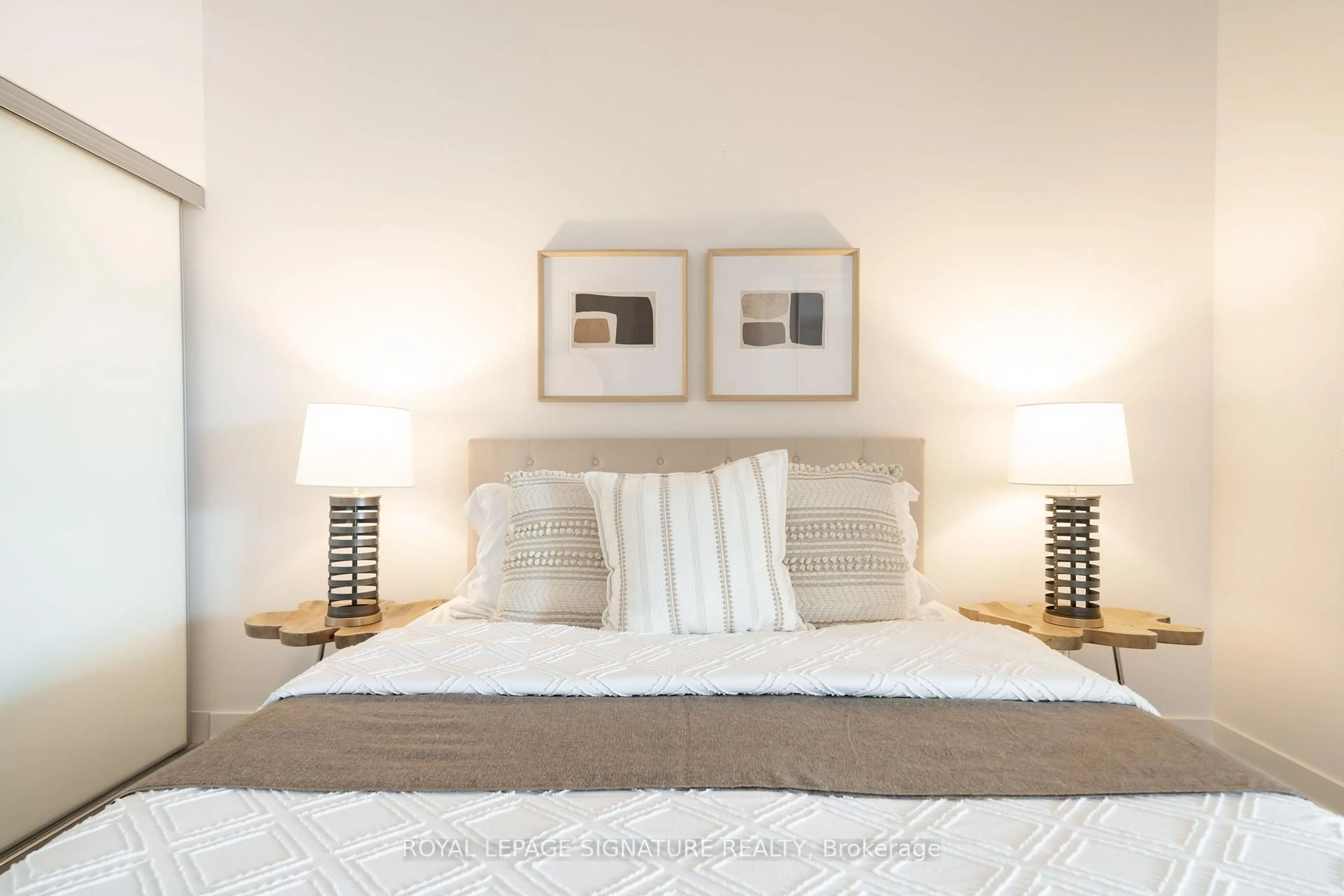 Bedroom with bed, wood/laminate floor for 1190 Dundas St #406, Toronto Ontario M4M 0C5