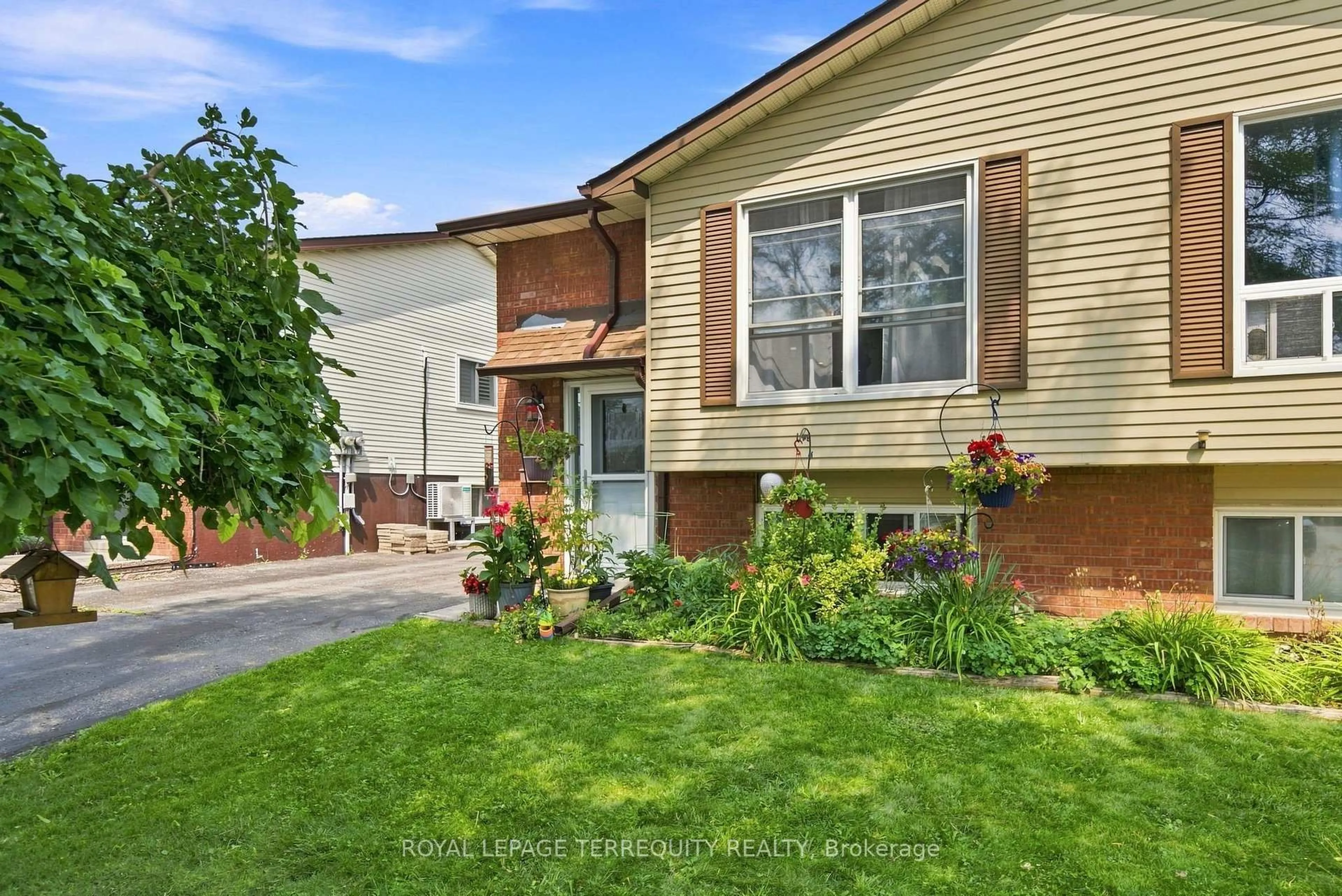 Home with brick exterior material, street for 224 Medina Crt, Oshawa Ontario L1J 7E1