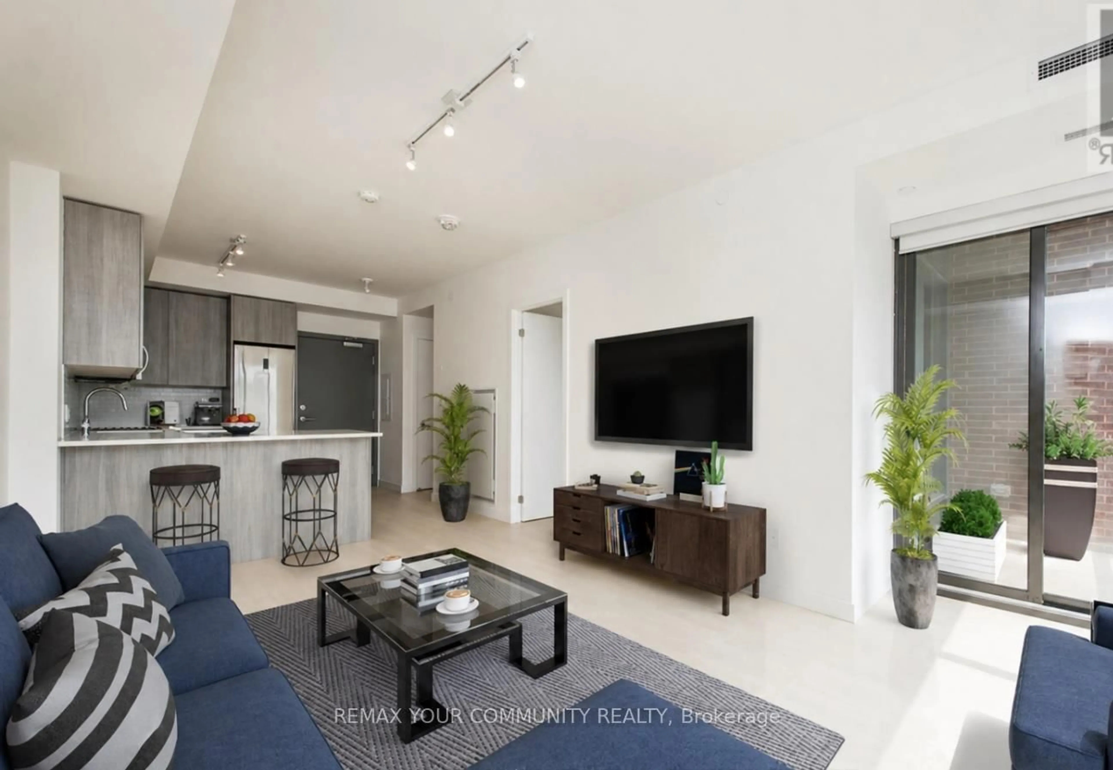 Living room with furniture, unknown for 246 Logan Ave #503, Toronto Ontario M4M 1J2
