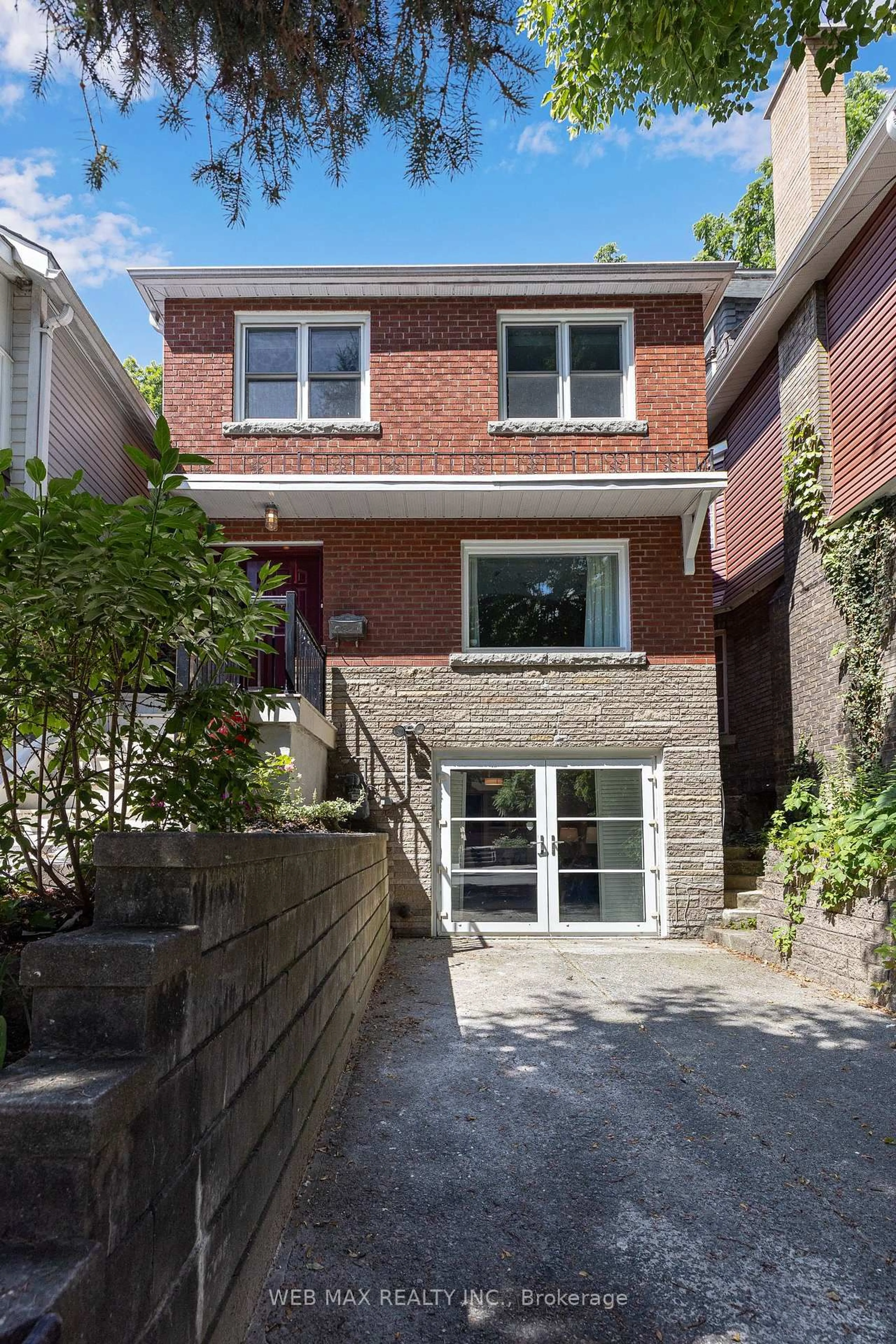 Home with brick exterior material, street for 18 Bellefair Ave, Toronto Ontario M4L 3T8