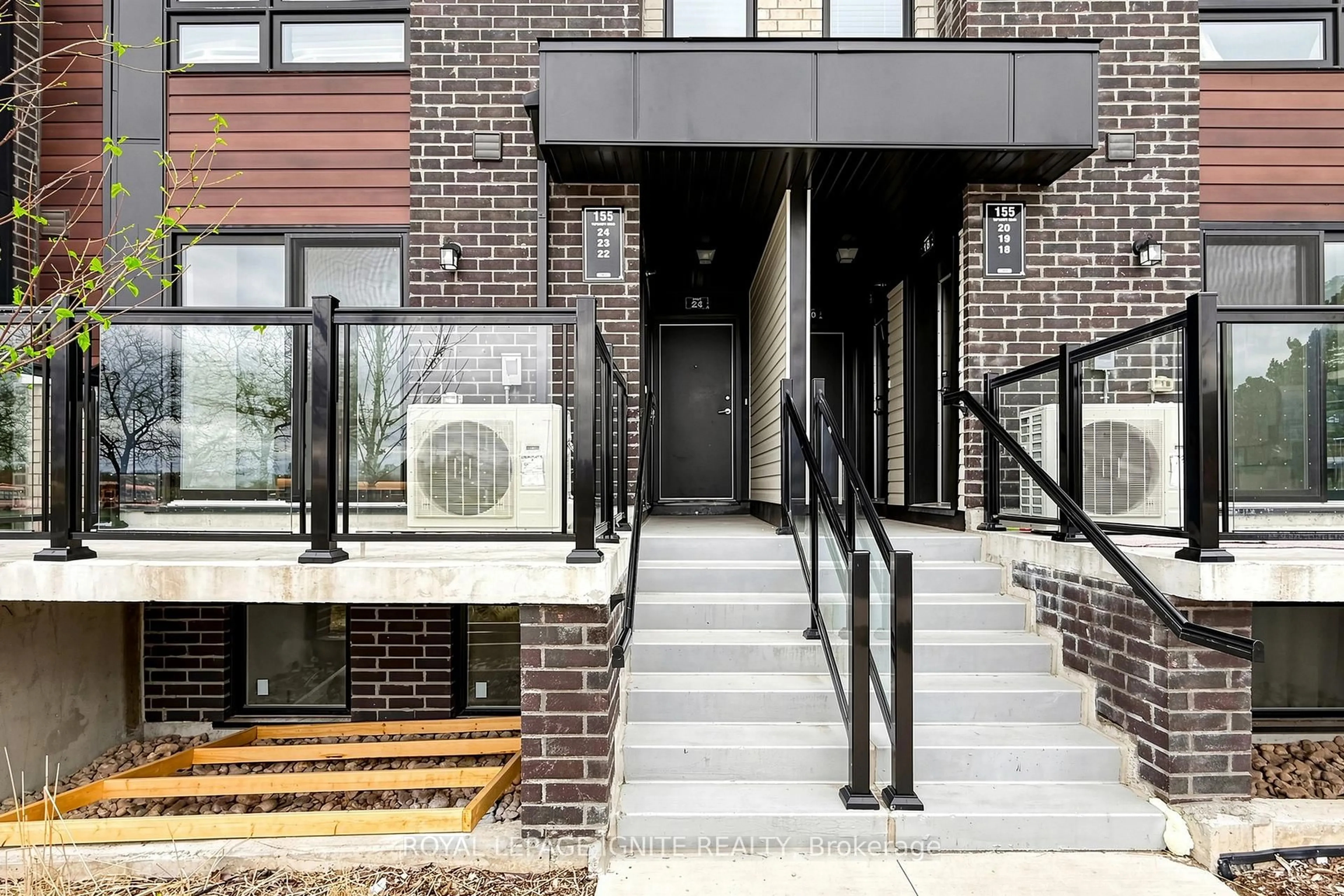 Home with brick exterior material, street for 155 Tapscott Rd #22, Toronto Ontario M1B 0E8