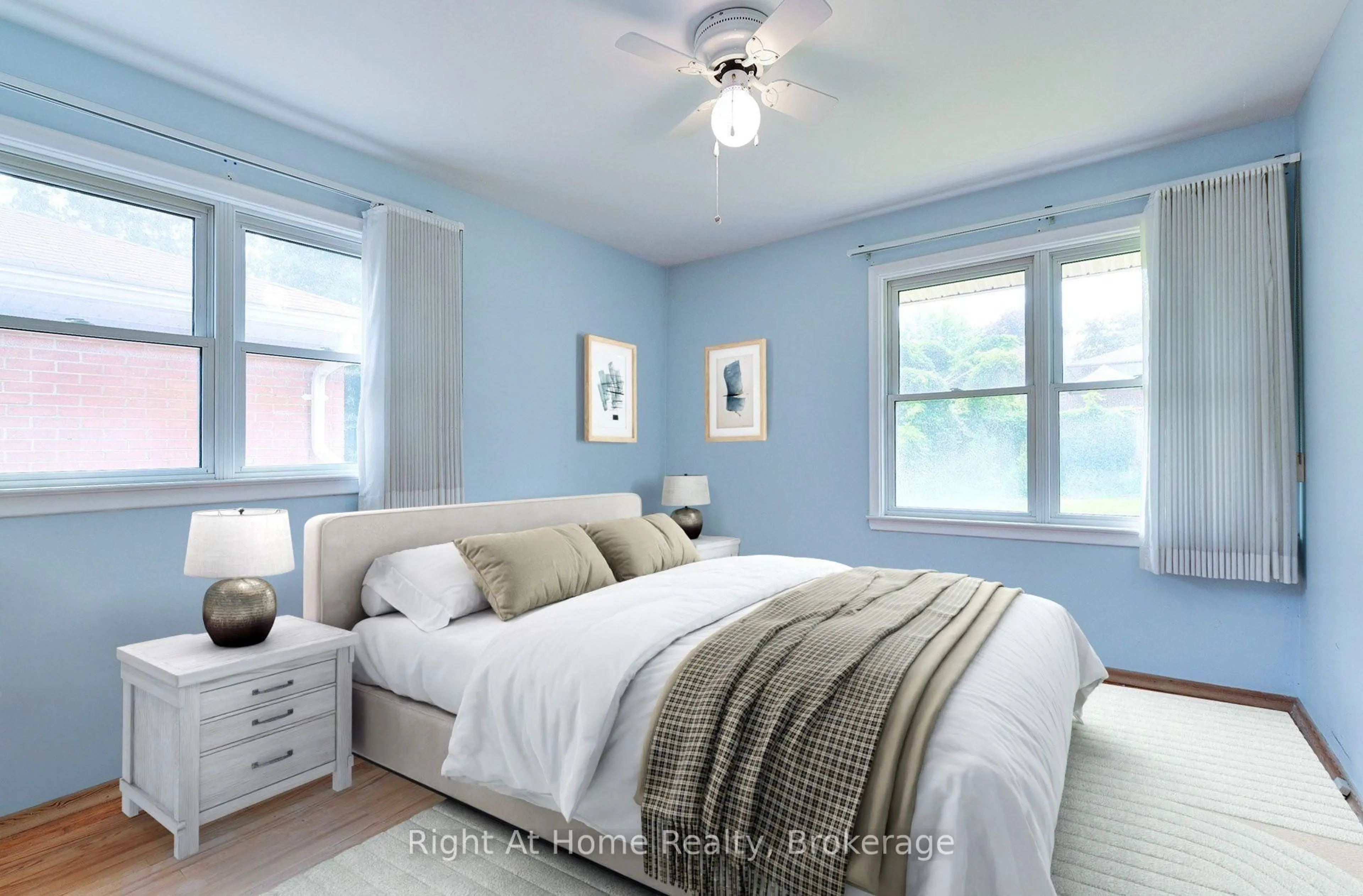 Bedroom with bed, wood/laminate floor for 544 Harmony Rd, Oshawa Ontario L1H 6V5