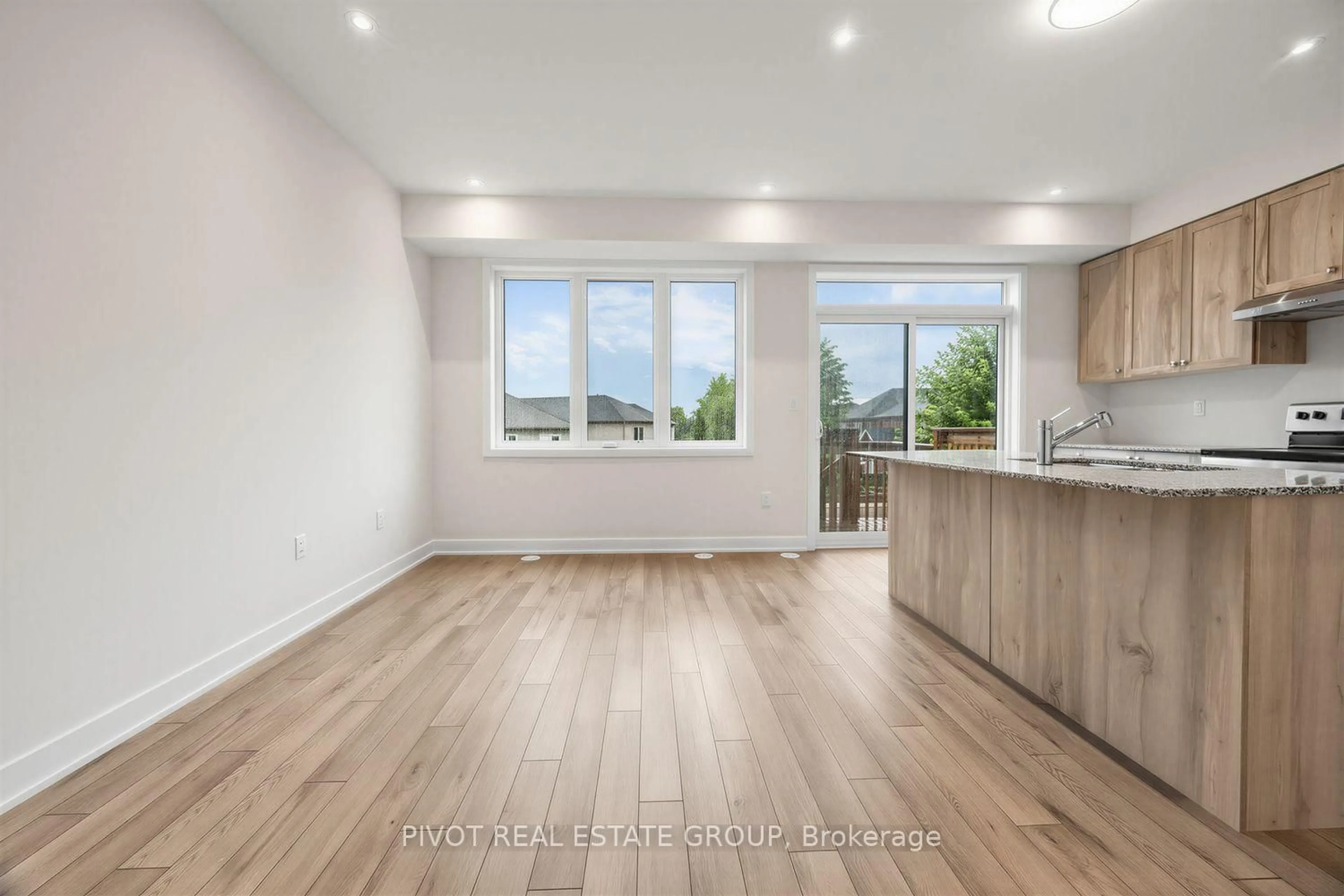 Open concept kitchen, wood/laminate floor for 1 Lively Way, Whitby Ontario L1R 0S3