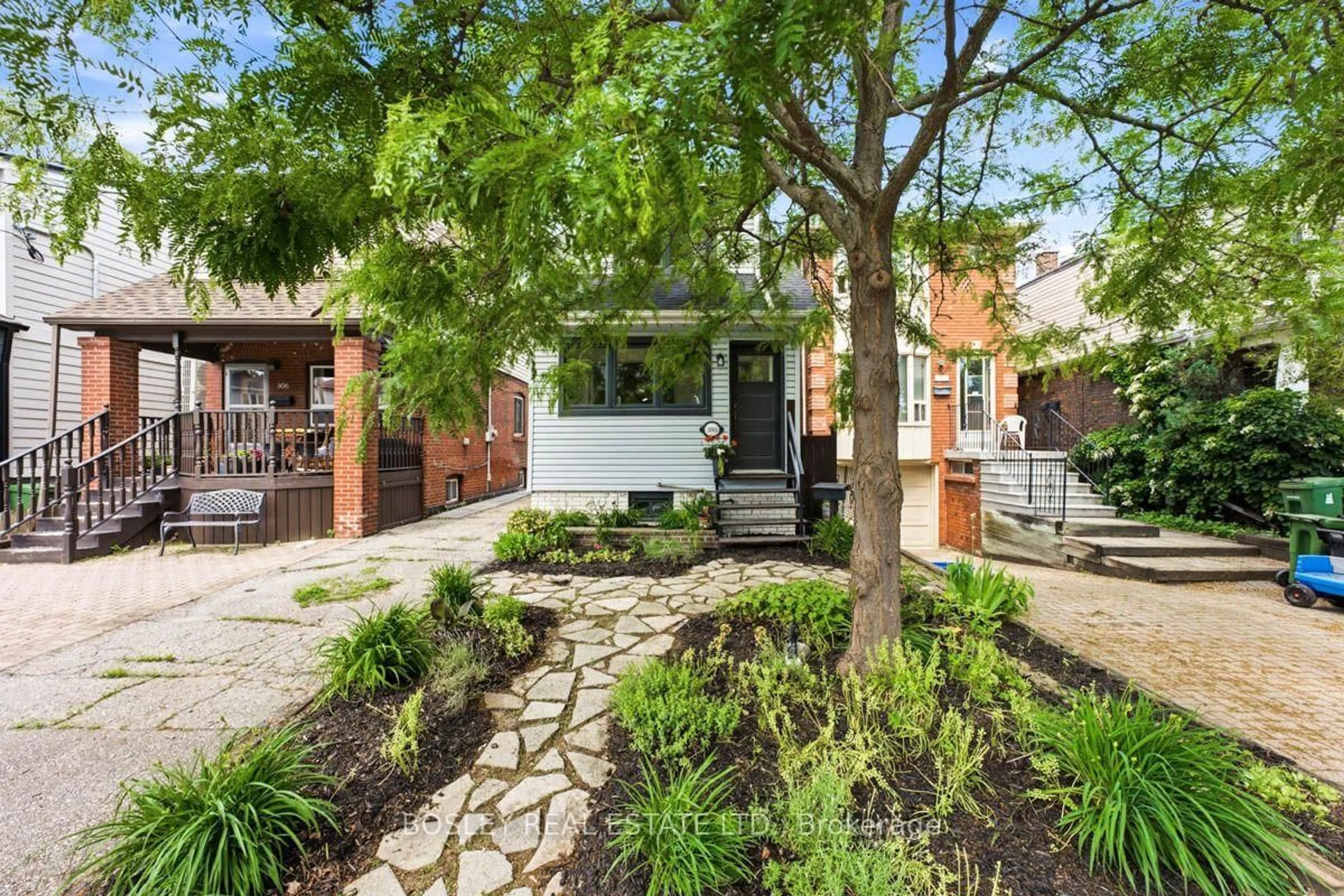 Home with brick exterior material, street for 308 Springdale Blvd, Toronto Ontario M4C 2A2