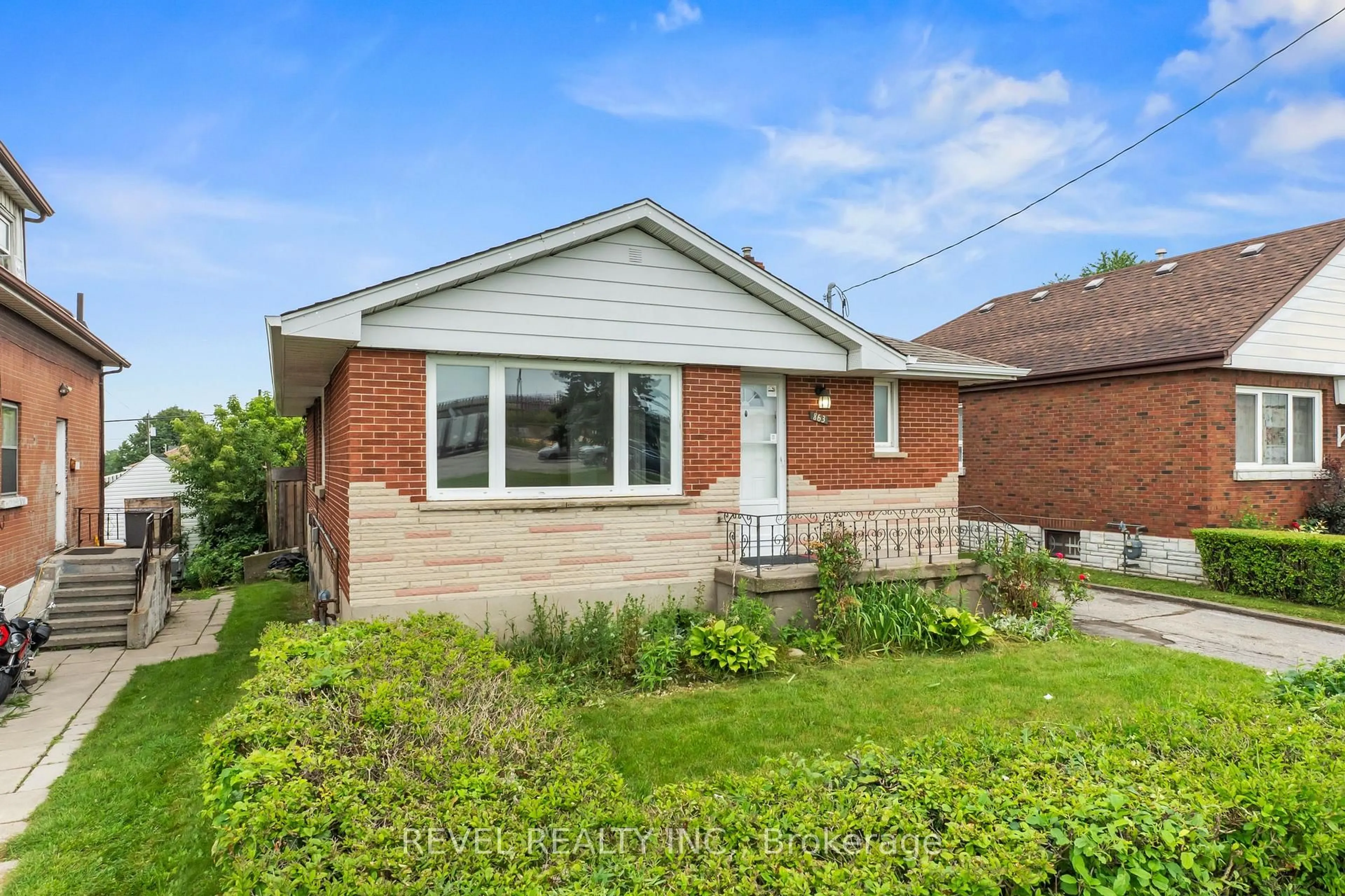 Home with brick exterior material, street for 863 Ritson Rd, Oshawa Ontario L1H 5L5