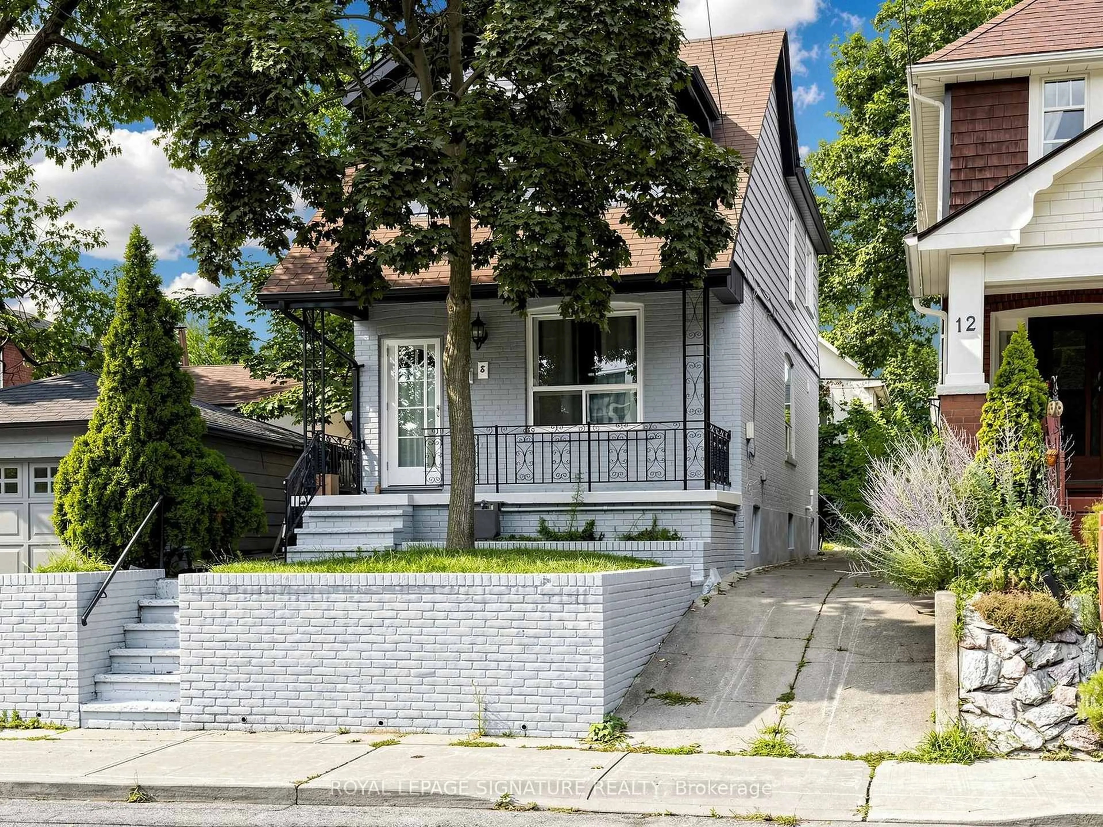 Home with brick exterior material, street for 8 Harris Ave, Toronto Ontario M4C 1P4