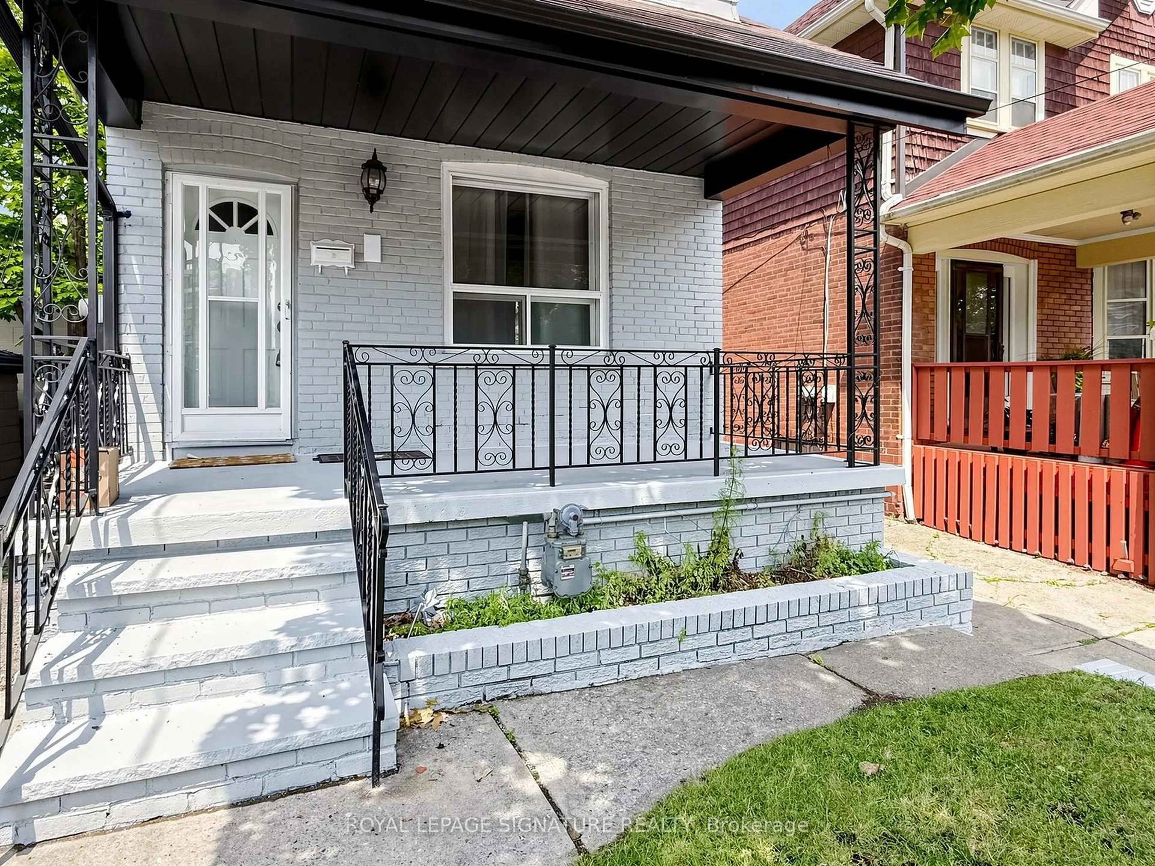 Home with brick exterior material, street for 8 Harris Ave, Toronto Ontario M4C 1P4