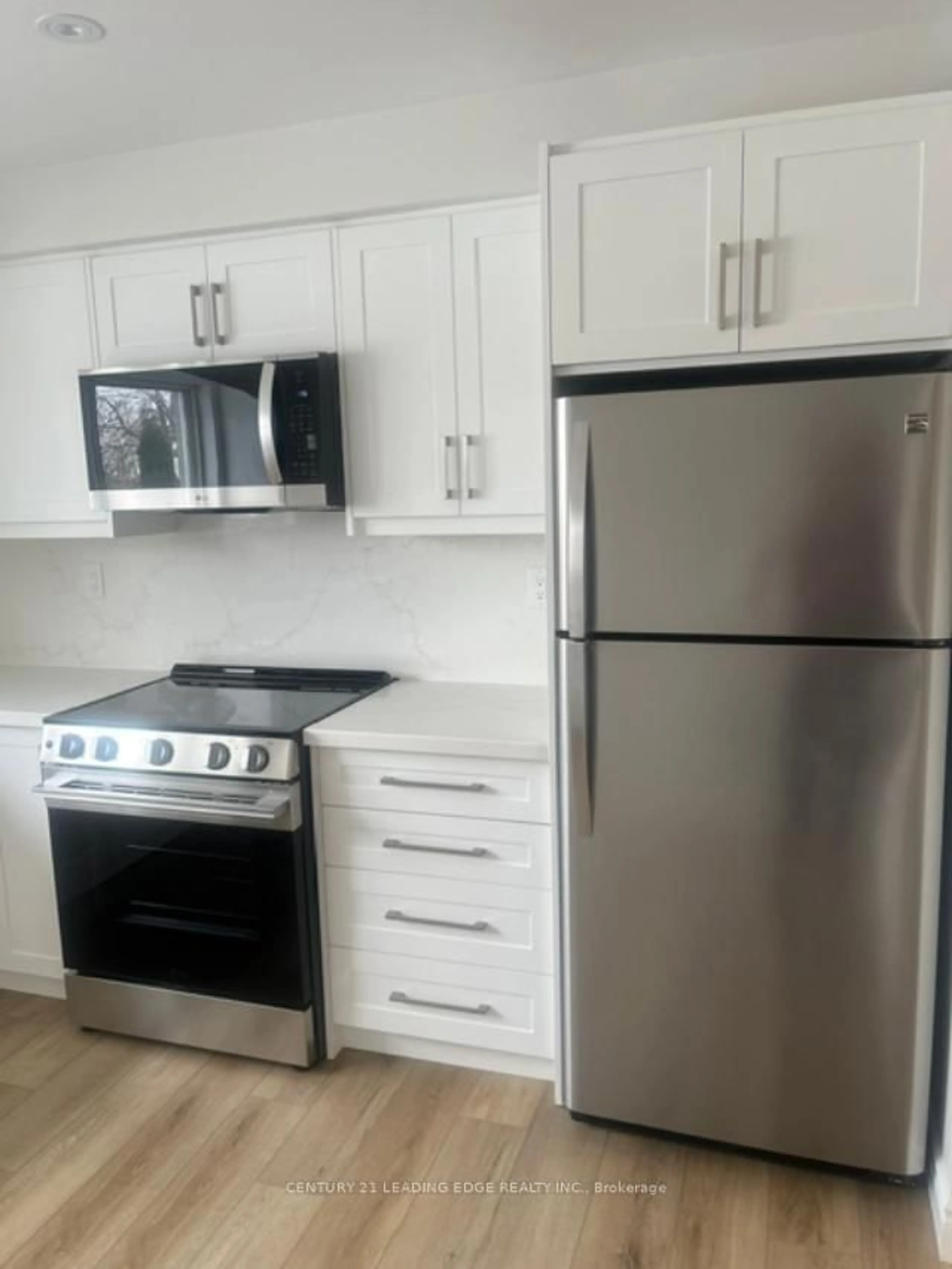 Standard kitchen, wood/laminate floor for 24 King Henrys Blvd, Toronto Ontario M1T 2V4