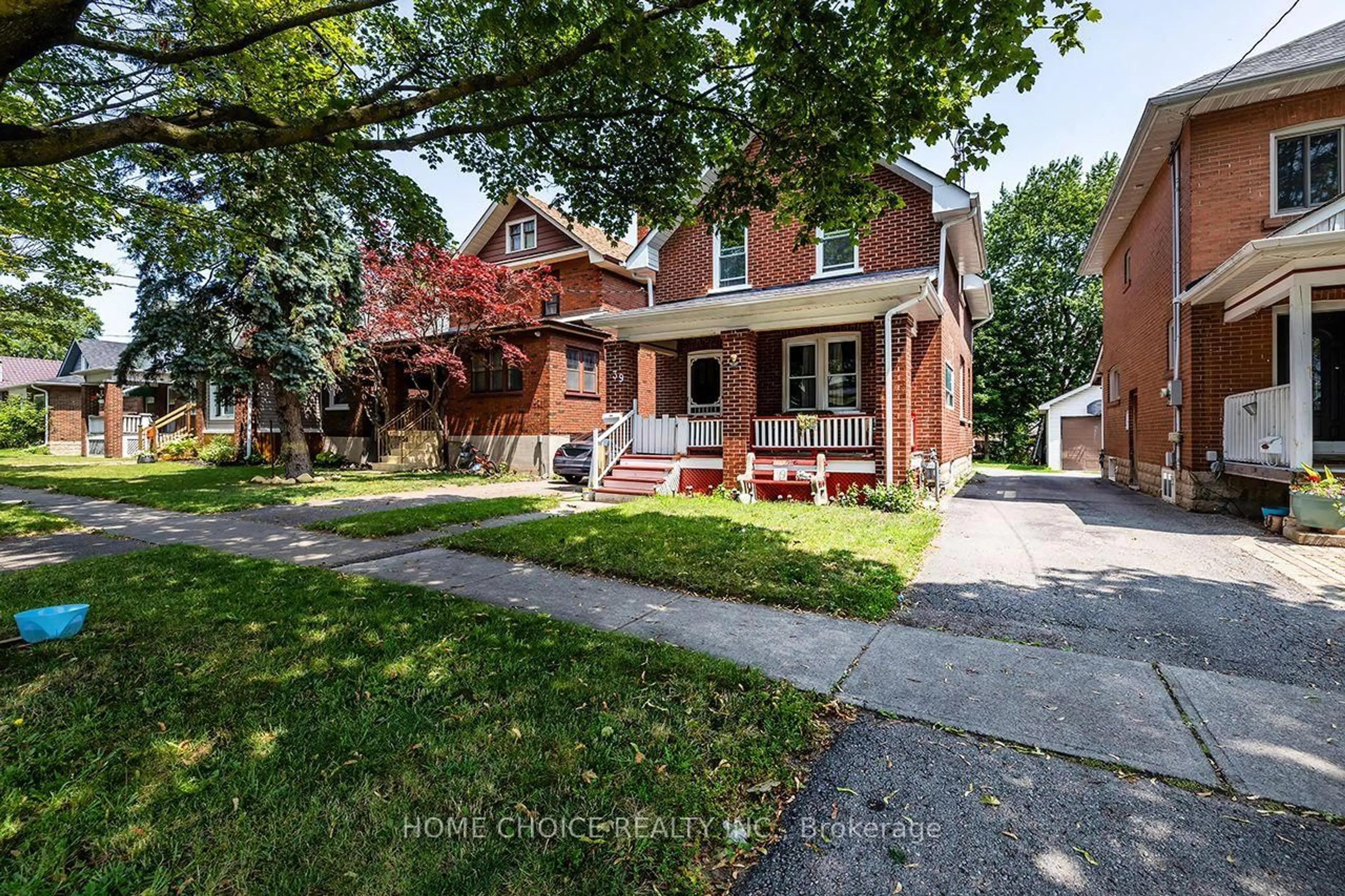 Home with brick exterior material, street for 39 Burk St, Oshawa Ontario L1J 4C1