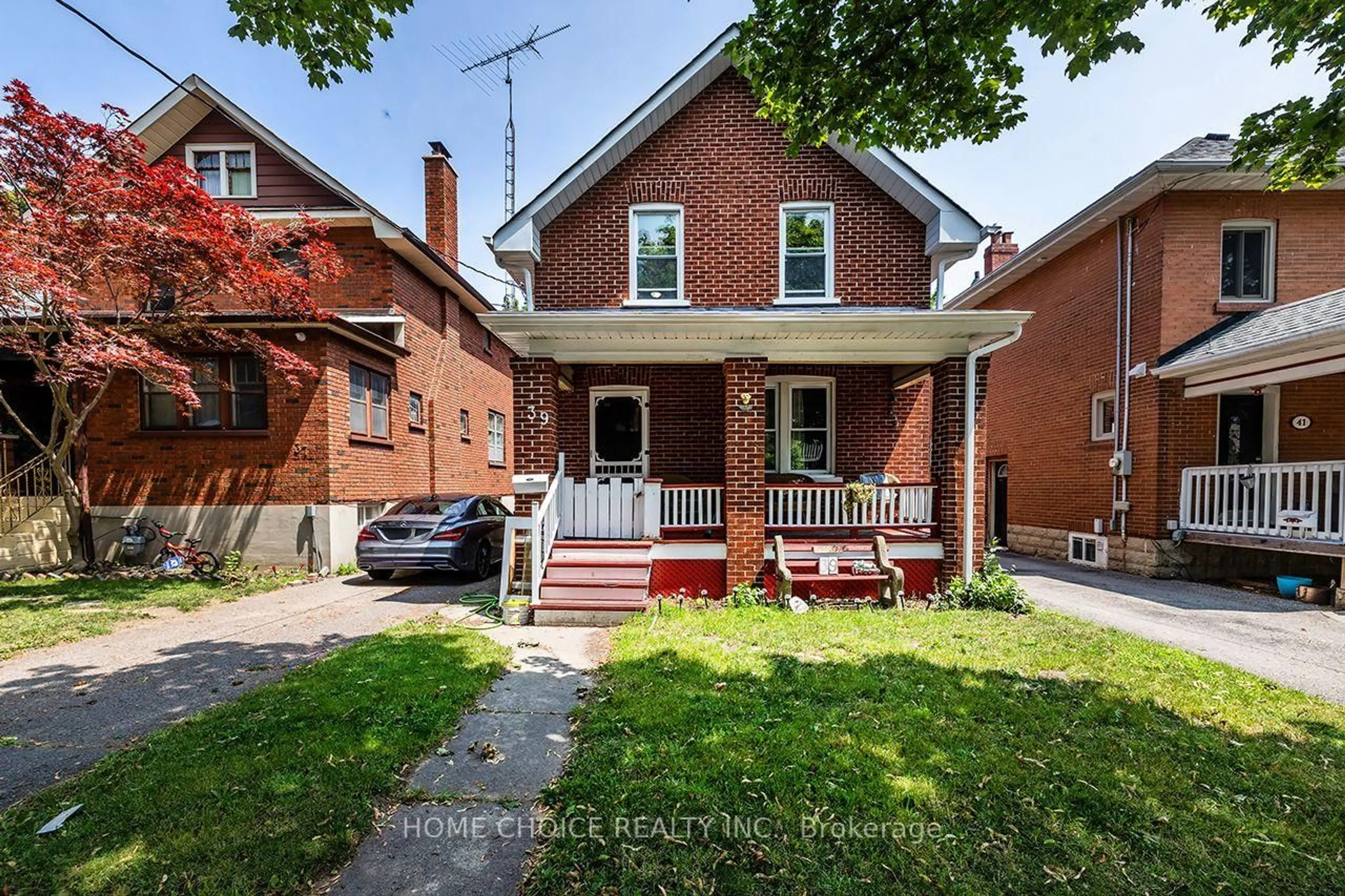 Home with brick exterior material, street for 39 Burk St, Oshawa Ontario L1J 4C1