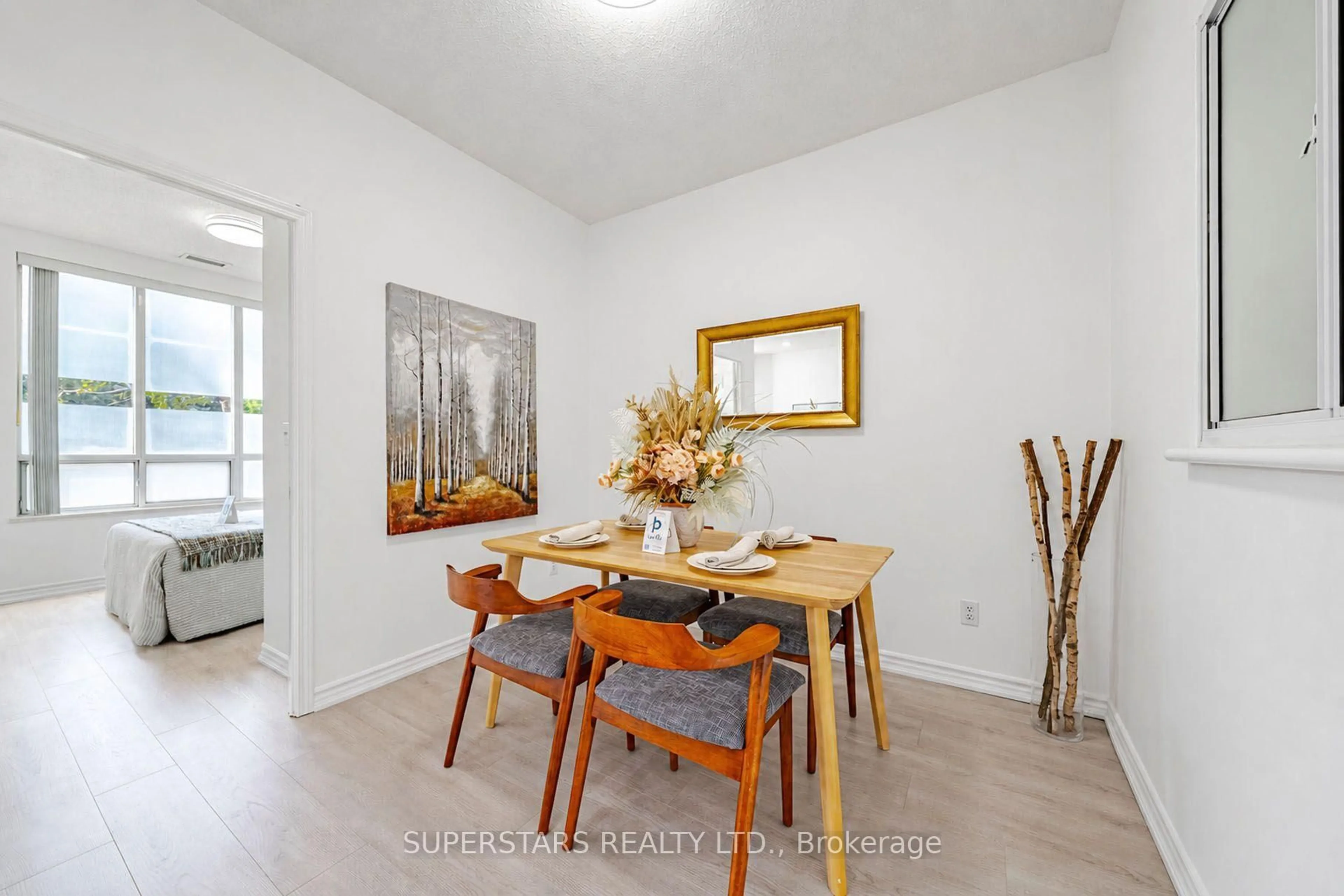 Dining room, wood/laminate floor for 5039 Finch Ave #109, Toronto Ontario M1S 5L6