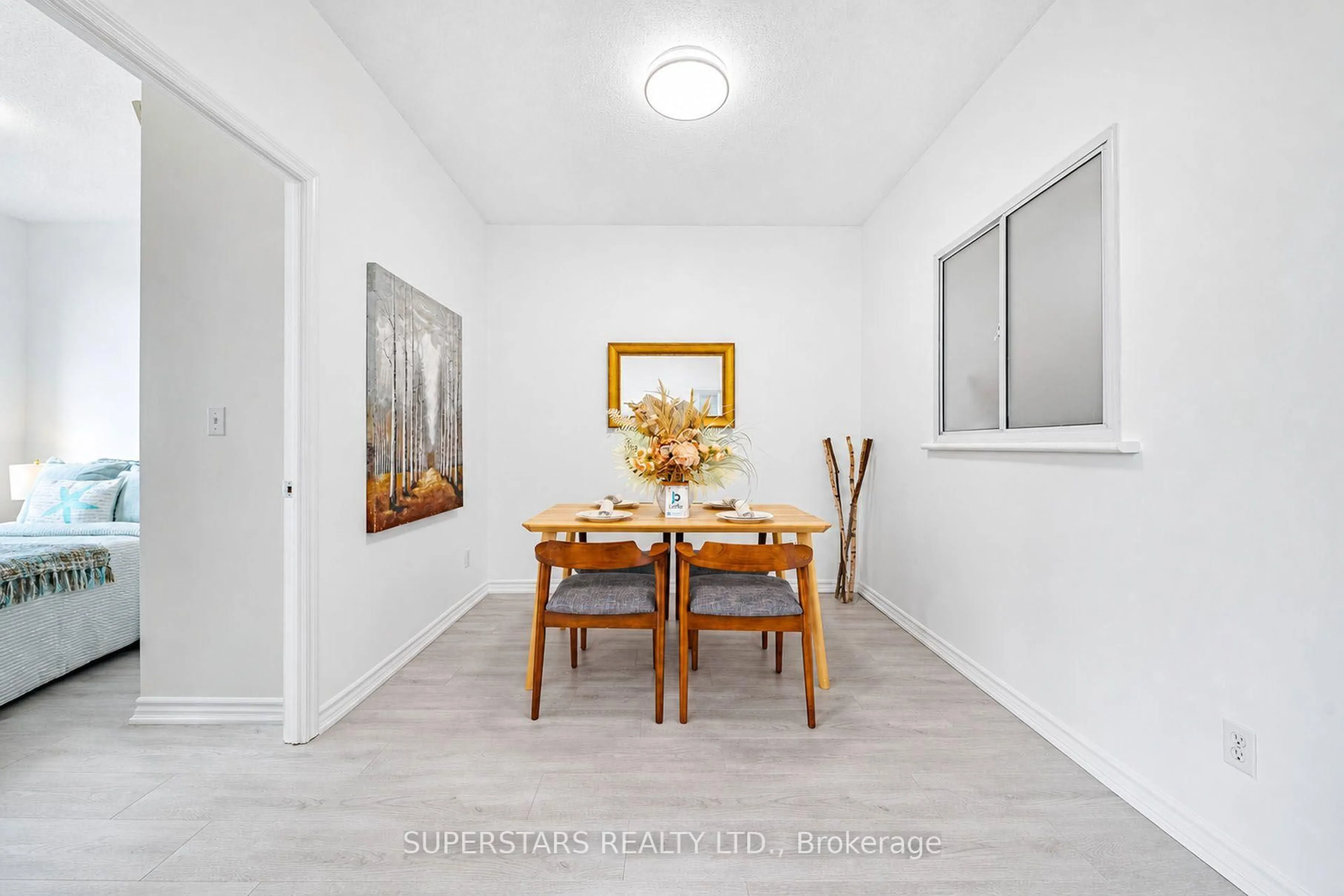 Dining room, wood/laminate floor for 5039 Finch Ave #109, Toronto Ontario M1S 5L6