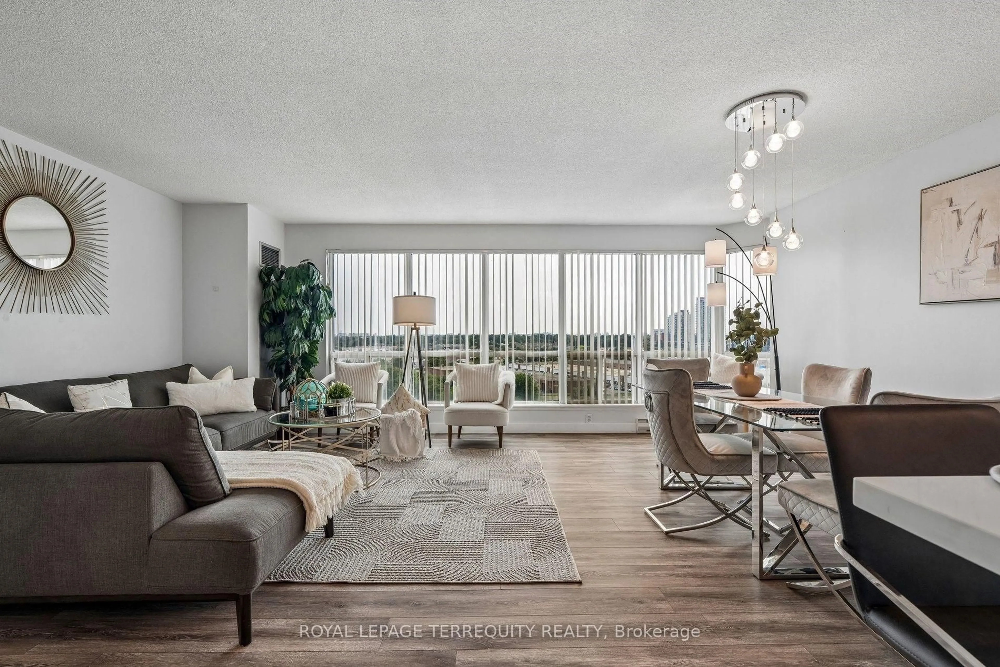 Living room with furniture, unknown for 18 Lee Centre Dr #906, Toronto Ontario M1H 3H5