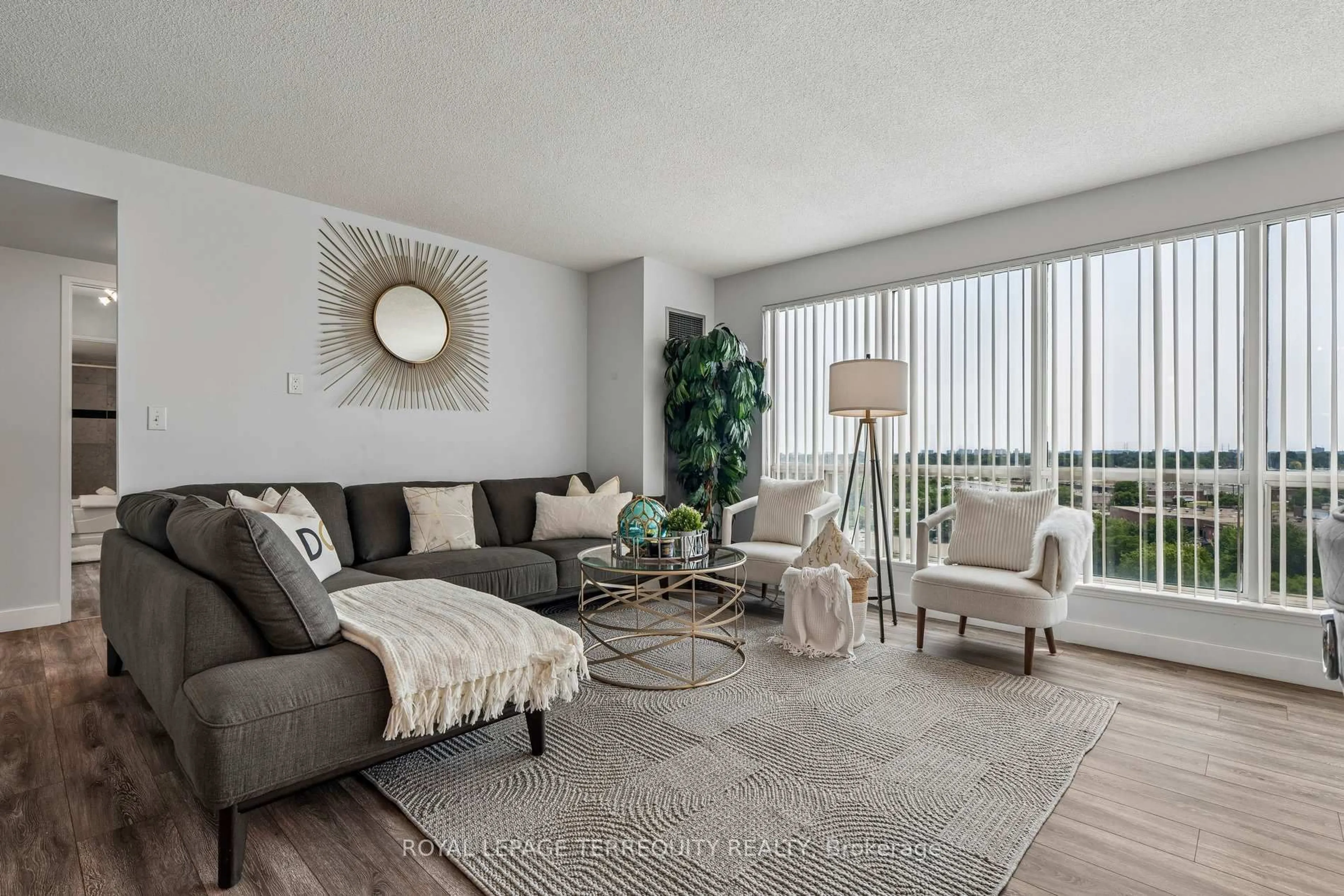 Living room with furniture, unknown for 18 Lee Centre Dr #906, Toronto Ontario M1H 3H5