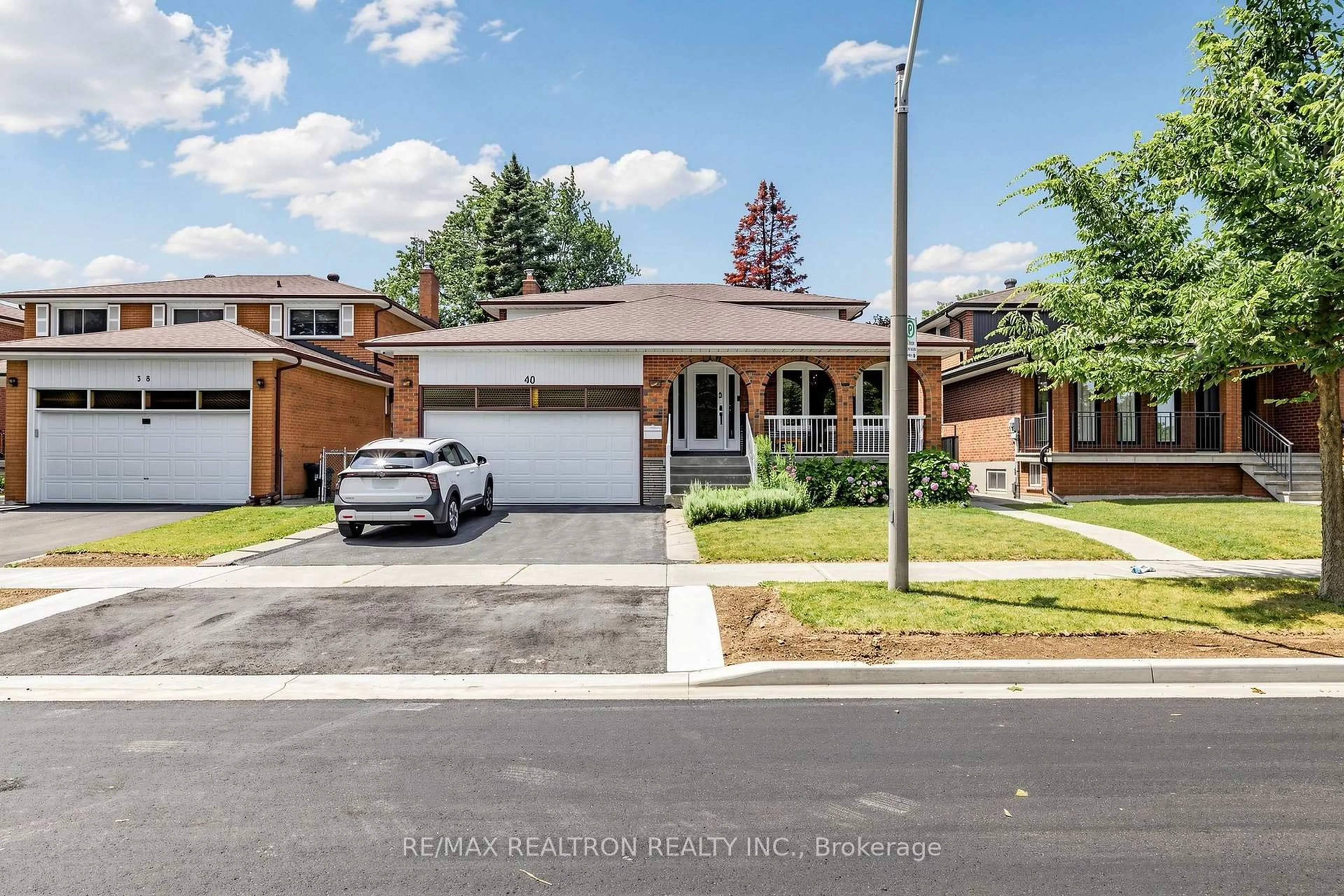 Home with brick exterior material, street for 40 Sesame St, Toronto Ontario M1W 2R4