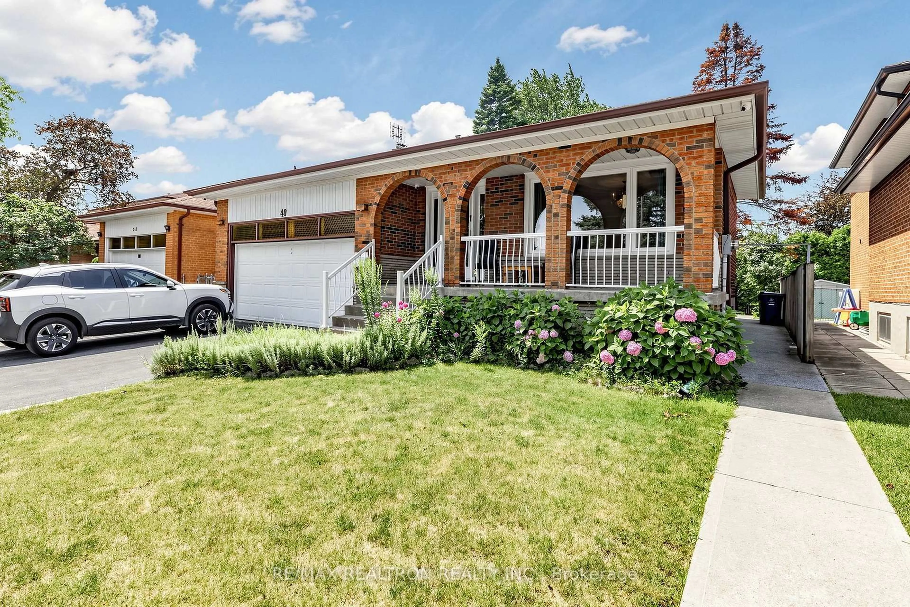 Home with brick exterior material, street for 40 Sesame St, Toronto Ontario M1W 2R4