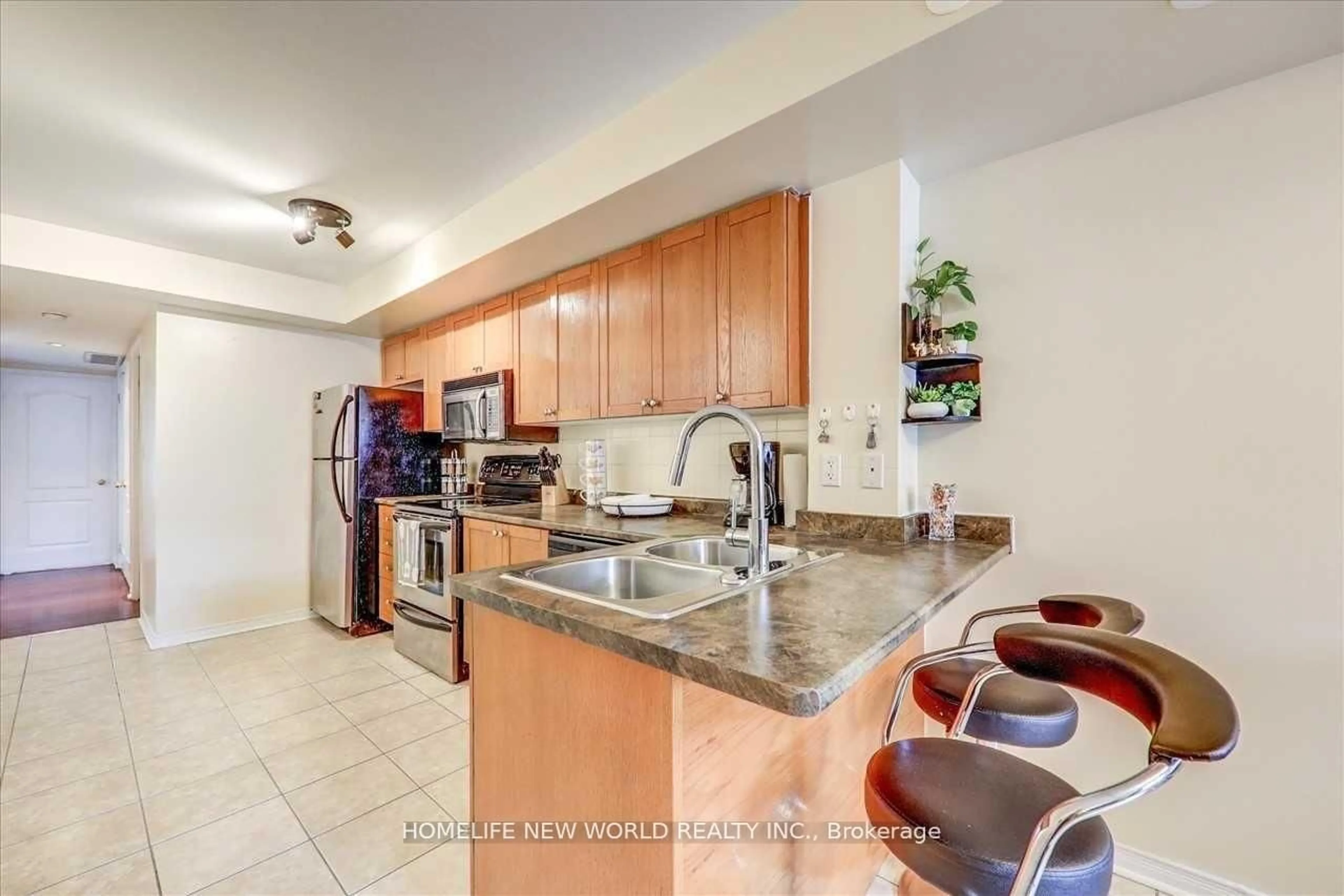 Standard kitchen, ceramic/tile floor for 35 Strangford Lane #204, Toronto Ontario M1L 0E5