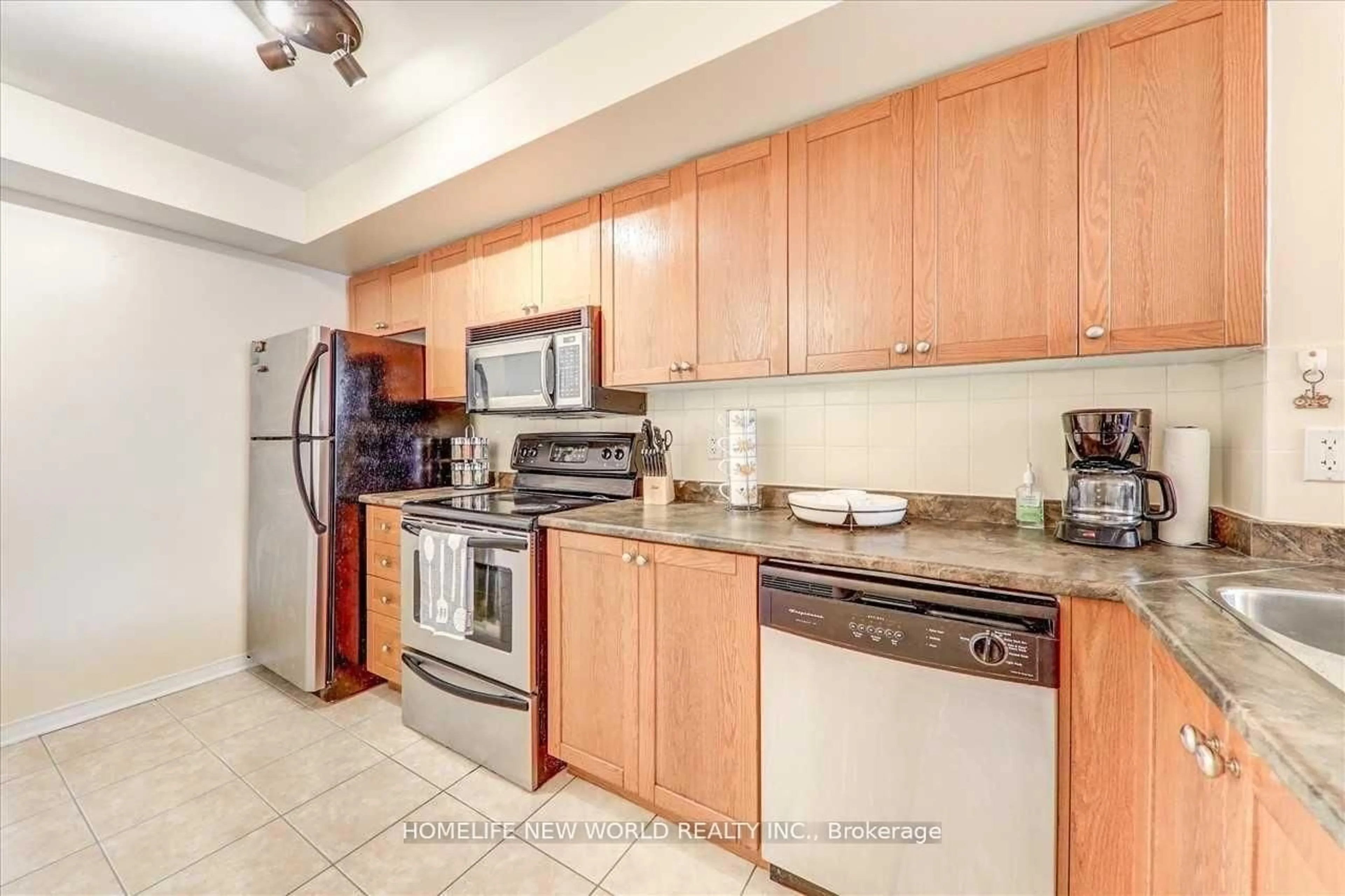Standard kitchen, ceramic/tile floor for 35 Strangford Lane #204, Toronto Ontario M1L 0E5