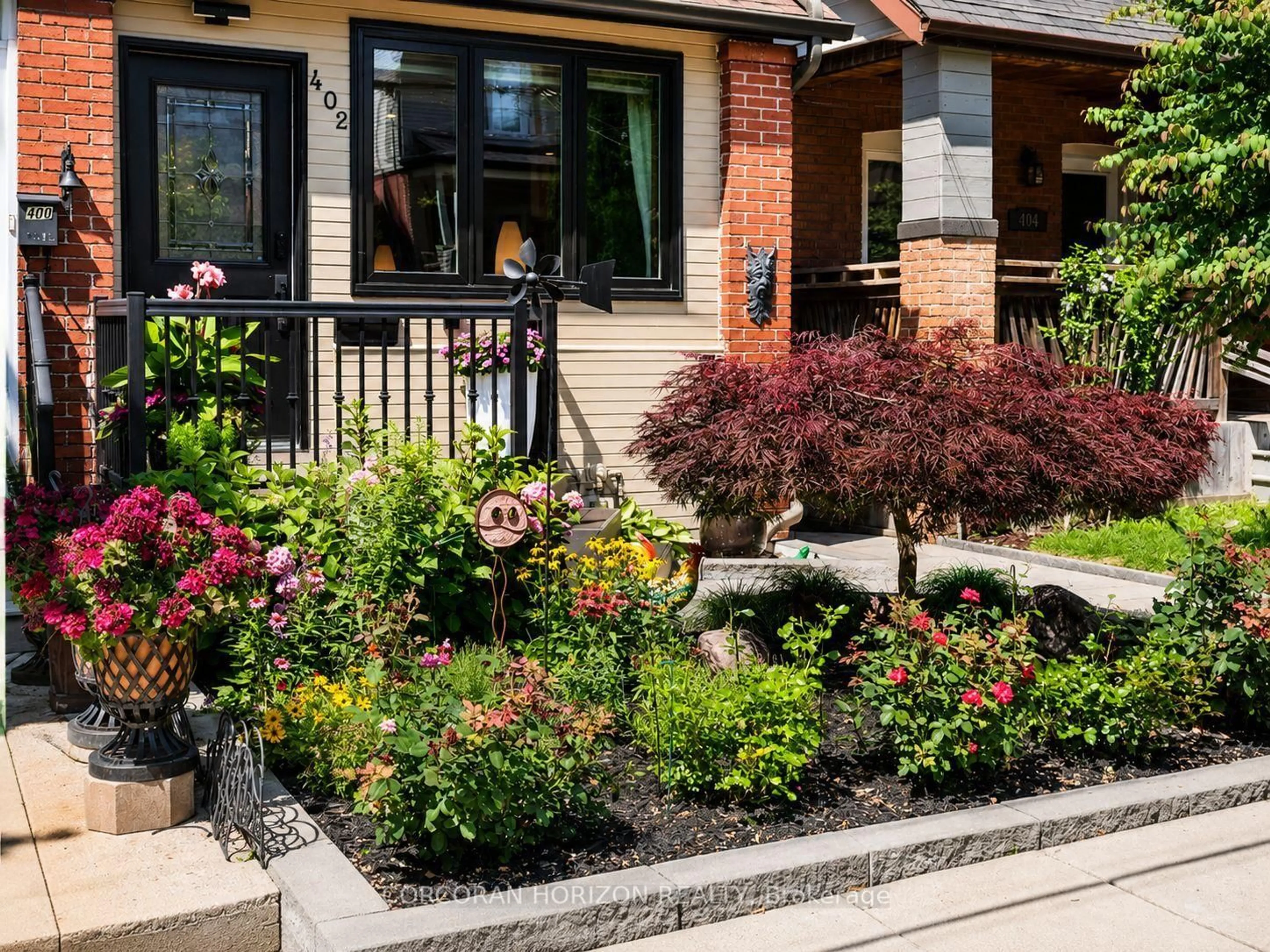 Patio, street for 402 Rhodes Ave, Toronto Ontario M4L 3A5