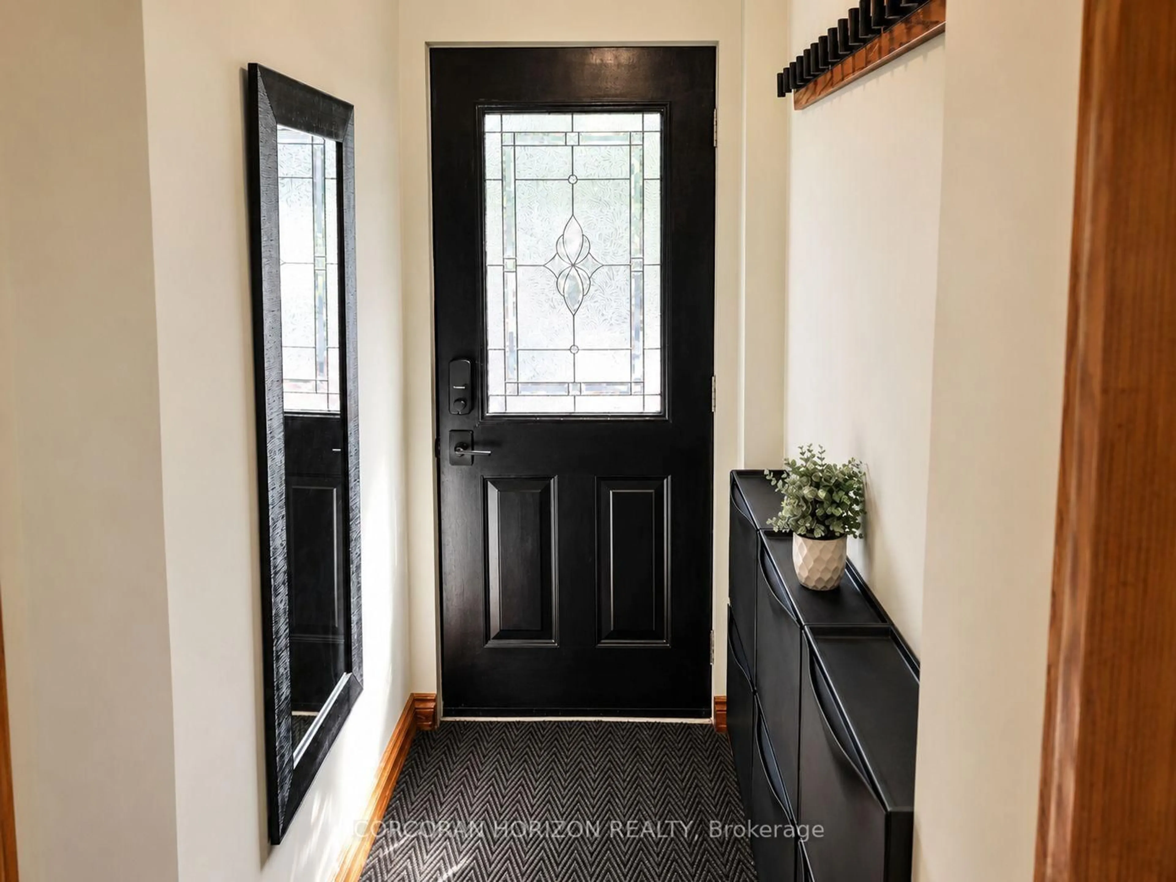 Indoor entryway for 402 Rhodes Ave, Toronto Ontario M4L 3A5