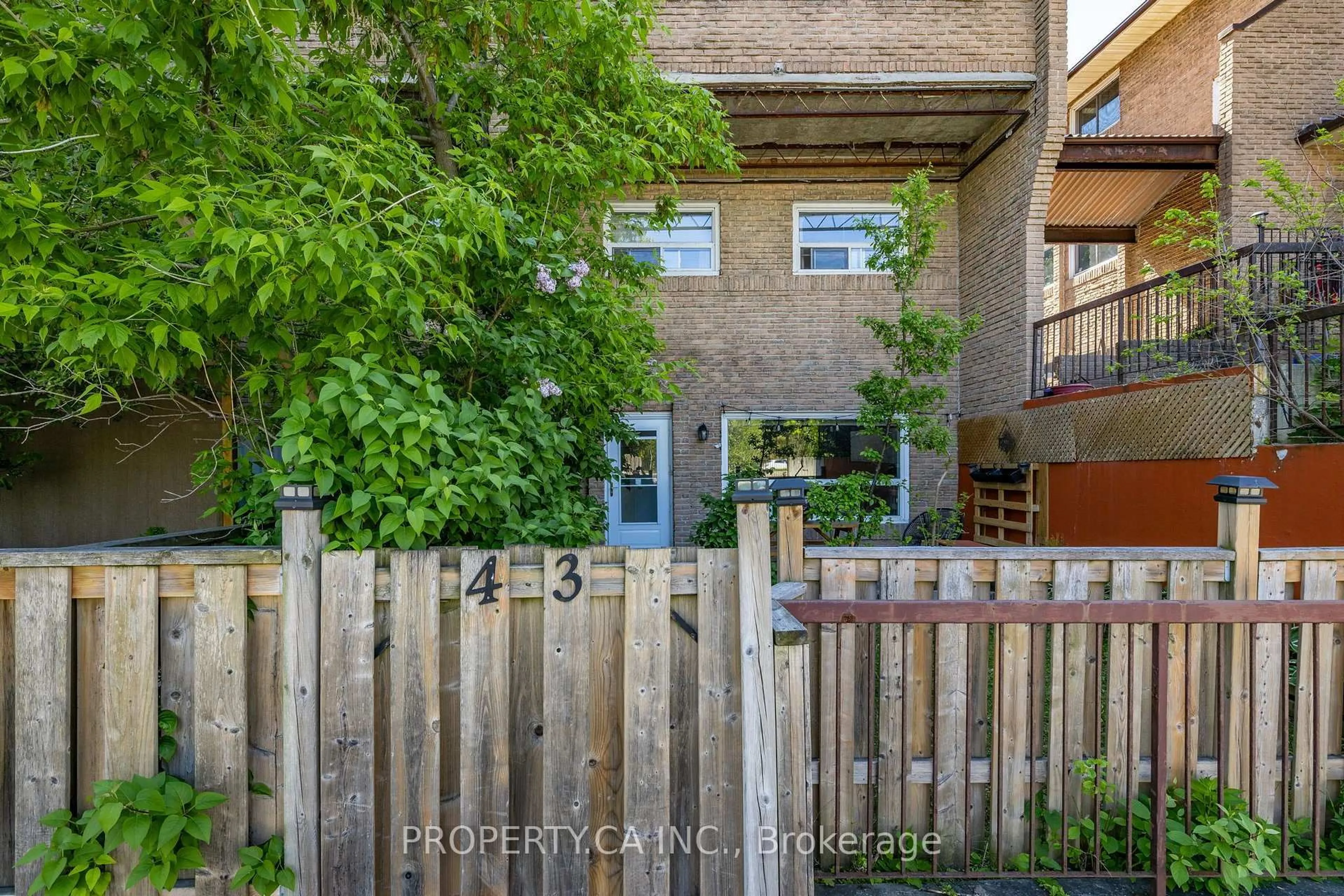 A pic from outside/outdoor area/front of a property/back of a property/a pic from drone, street for 91 Muir Dr #43, Toronto Ontario M1M 3T7