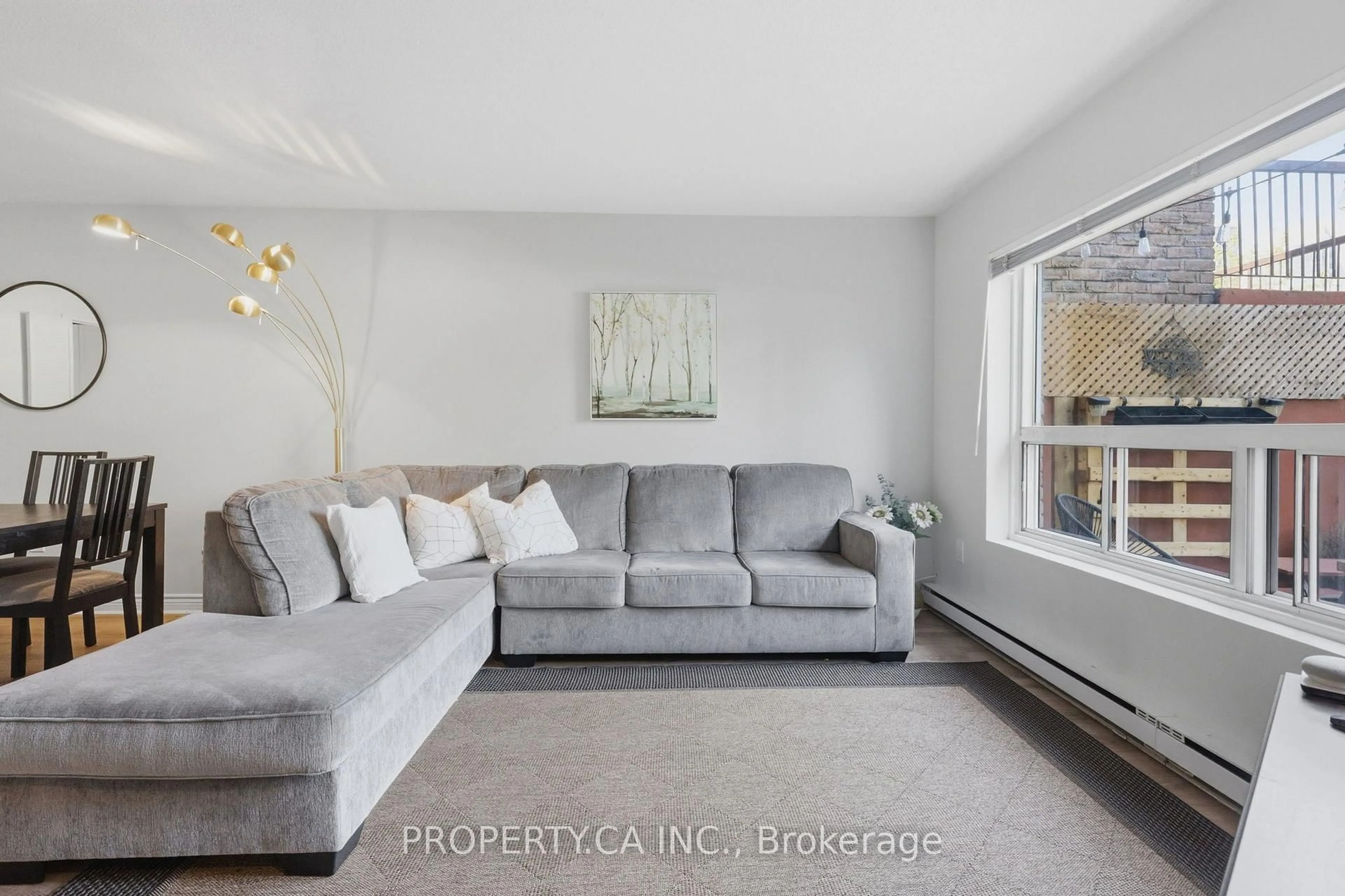 Living room with furniture, unknown for 91 Muir Dr #43, Toronto Ontario M1M 3T7