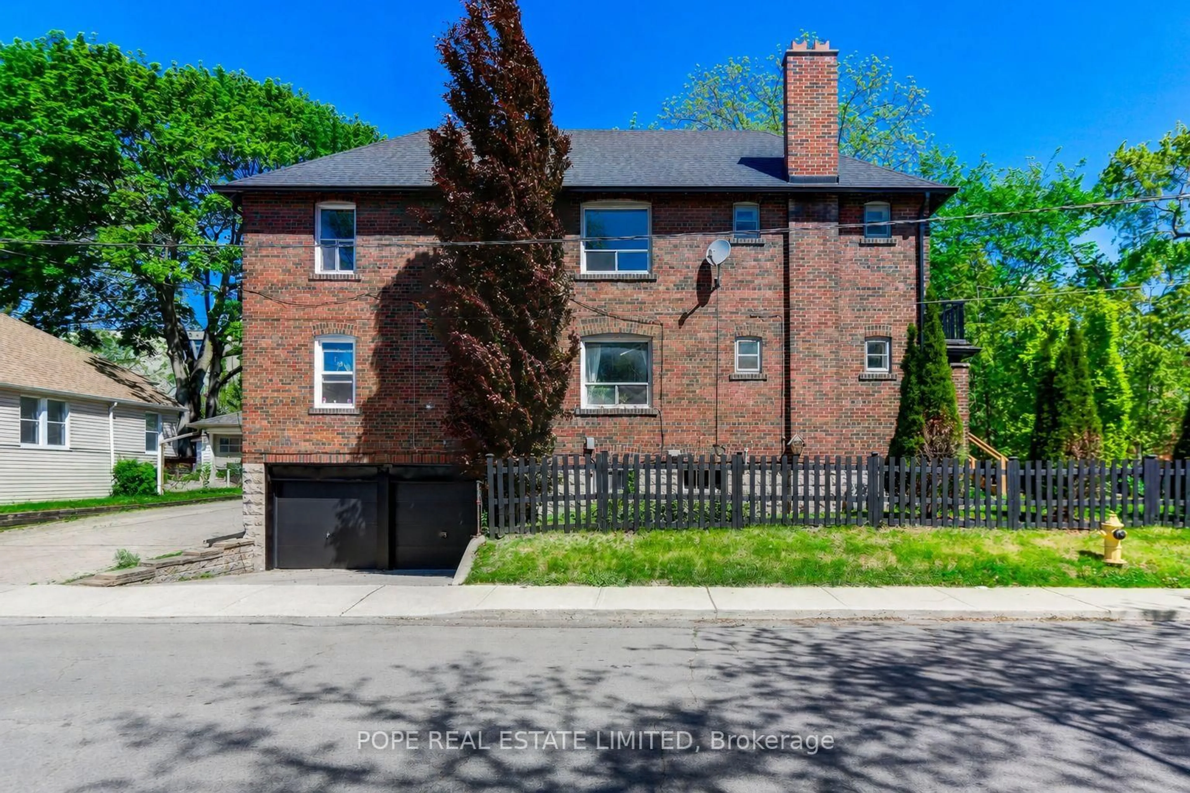 Home with brick exterior material, street for 18 Edgewood Ave, Toronto Ontario M4L 3E6