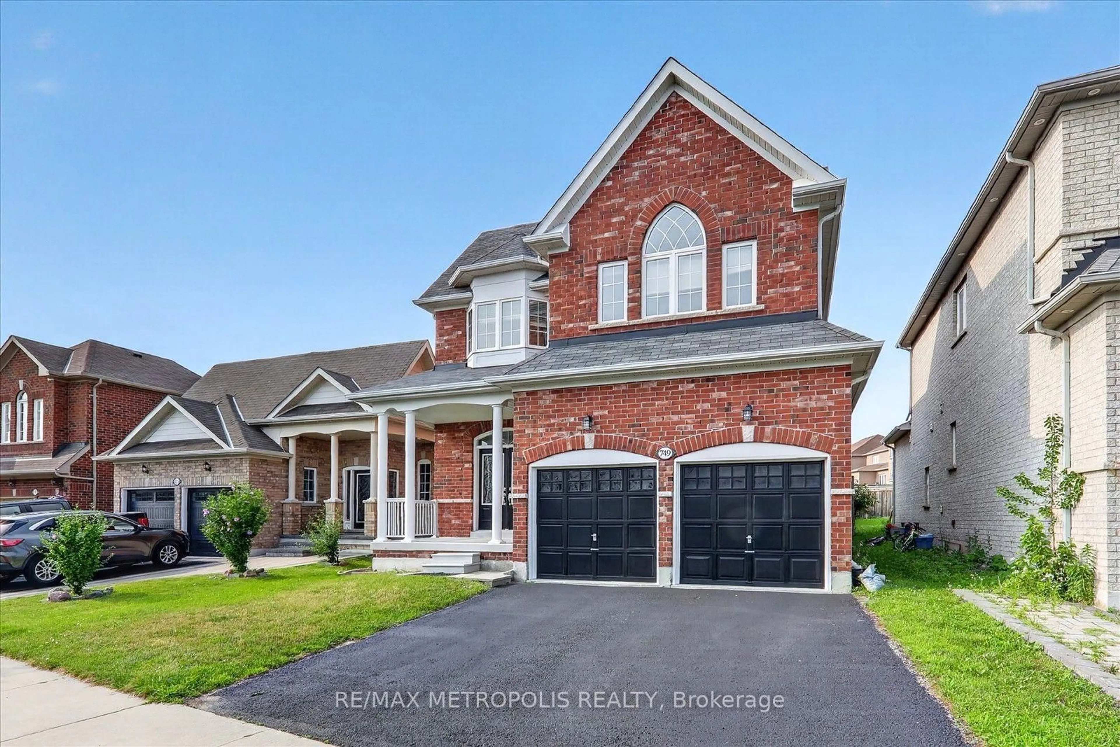Home with brick exterior material, street for 749 Black Cherry Dr, Oshawa Ontario L1K 0P4