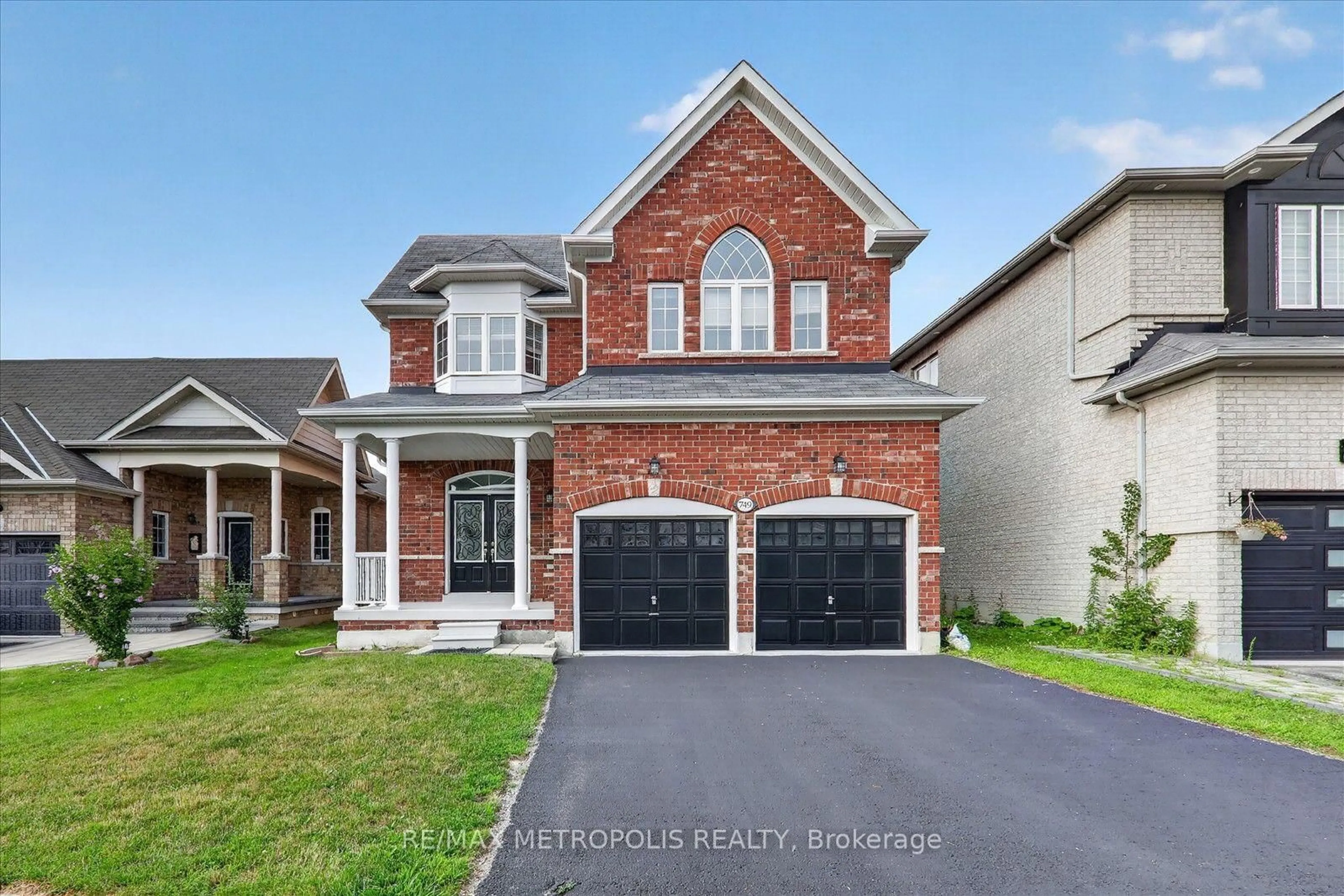 Home with brick exterior material, street for 749 Black Cherry Dr, Oshawa Ontario L1K 0P4