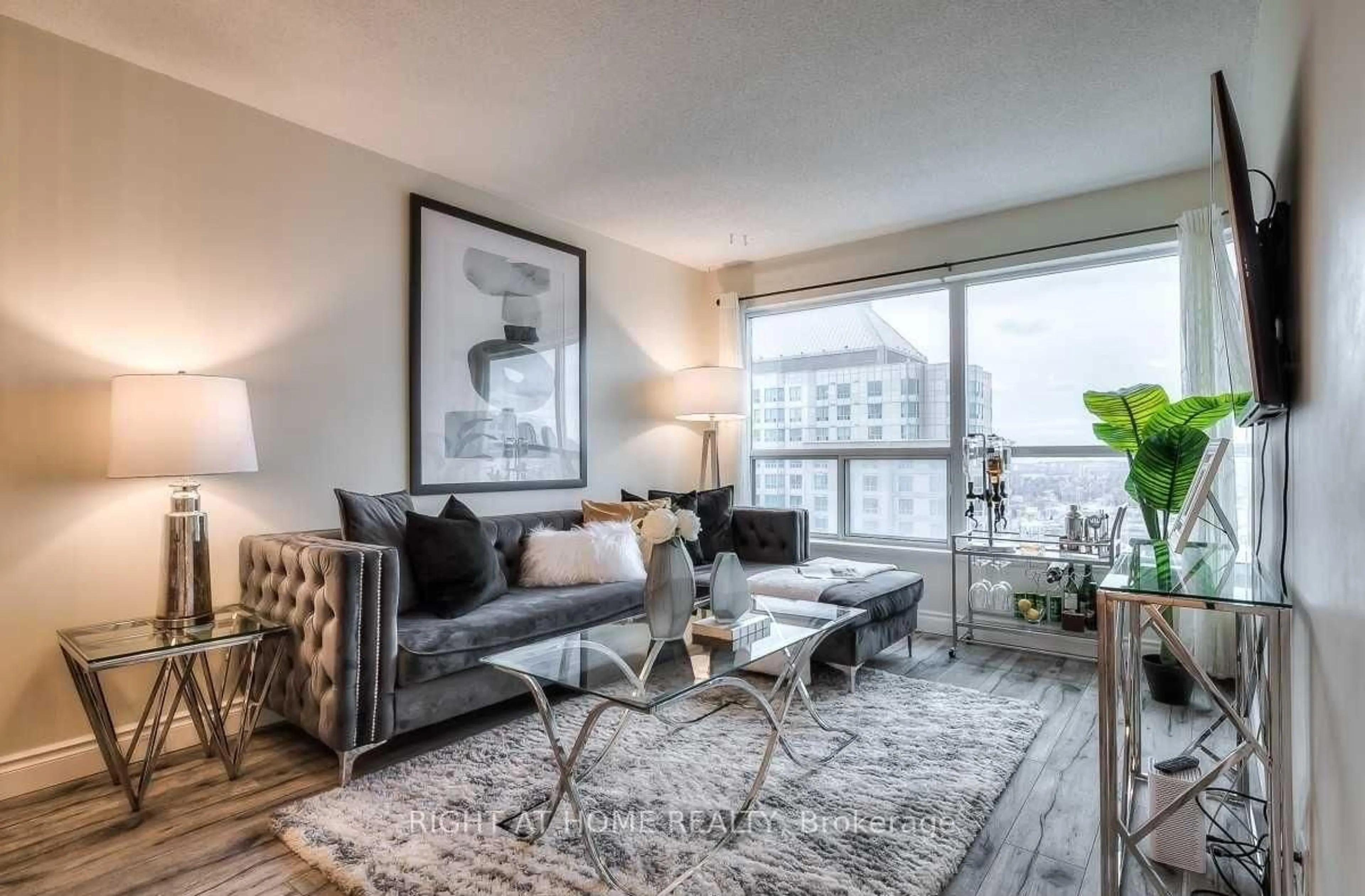 Living room with furniture, unknown for 38 Lee Centre Dr #2308, Toronto Ontario M1H 3J7
