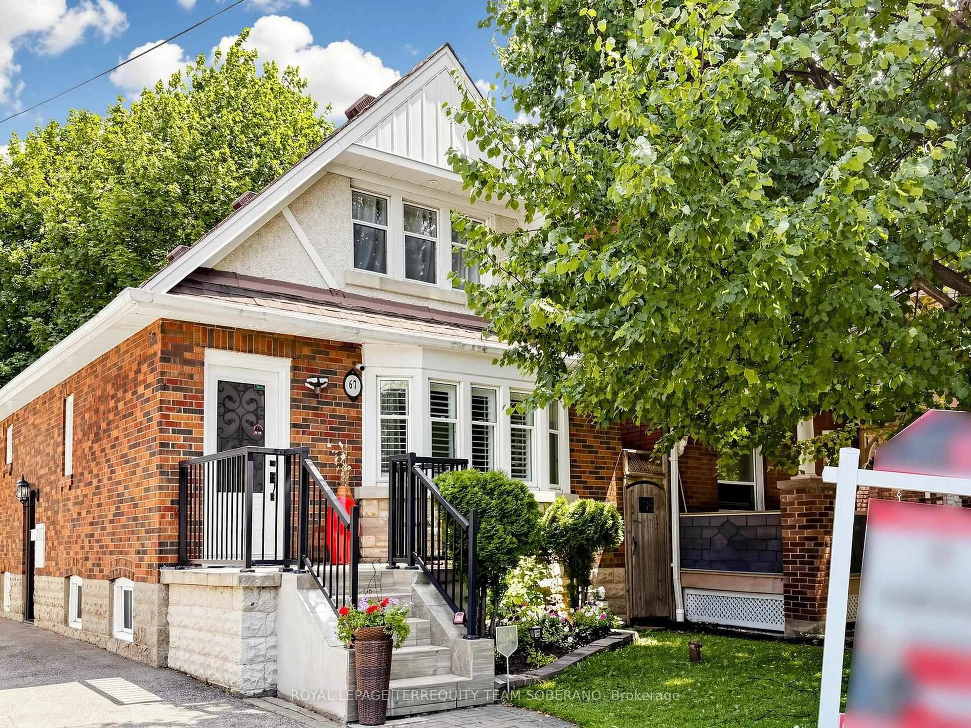 Home with brick exterior material, street for 67 Barrington Ave, Toronto Ontario M4C 4Y9