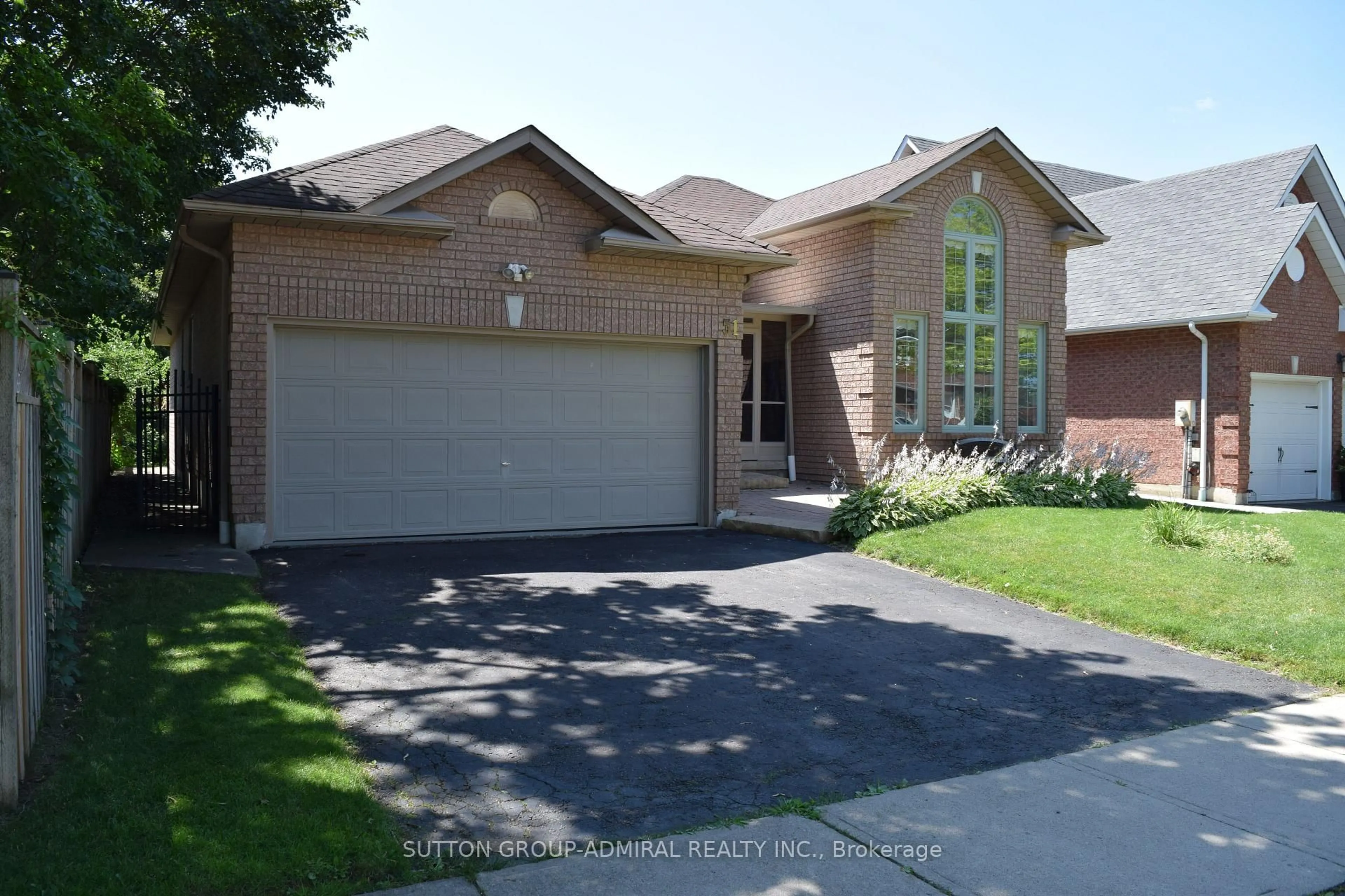 Home with brick exterior material, street for 51 Daines Dr, Whitby Ontario L1R 2E8