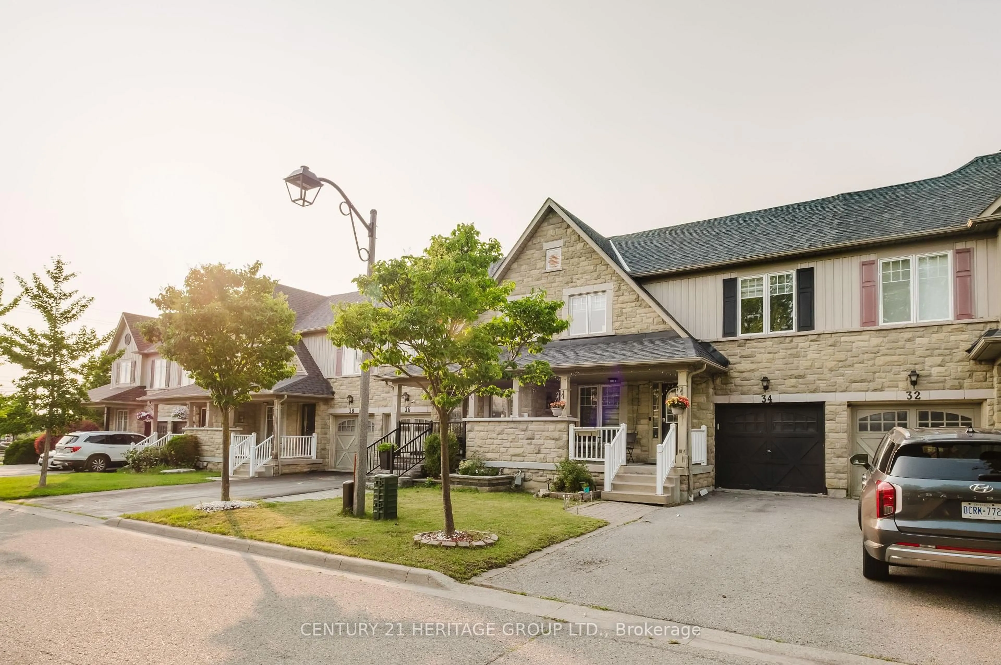 Home with brick exterior material, street for 34 Haverhill Cres, Whitby Ontario L1R 3E7