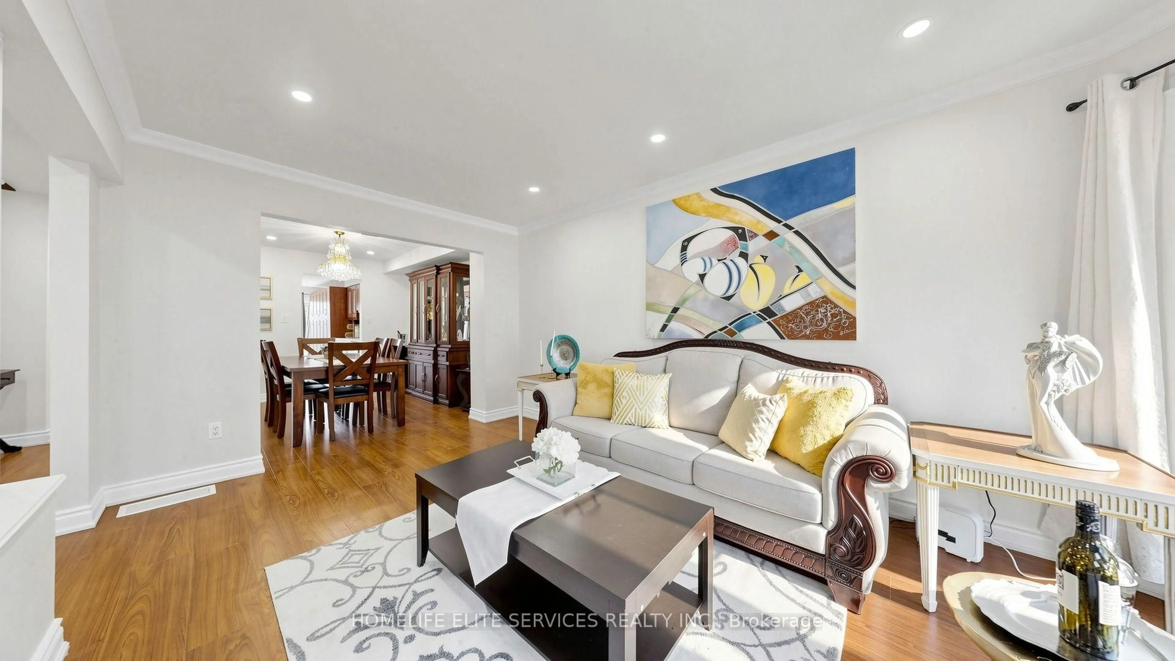 Living room with furniture, wood/laminate floor for 54 Fearn Cres, Ajax Ontario L1S 5L4